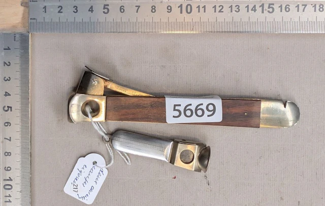 2 antique cigar cutters—see photos for dimensions and condition
