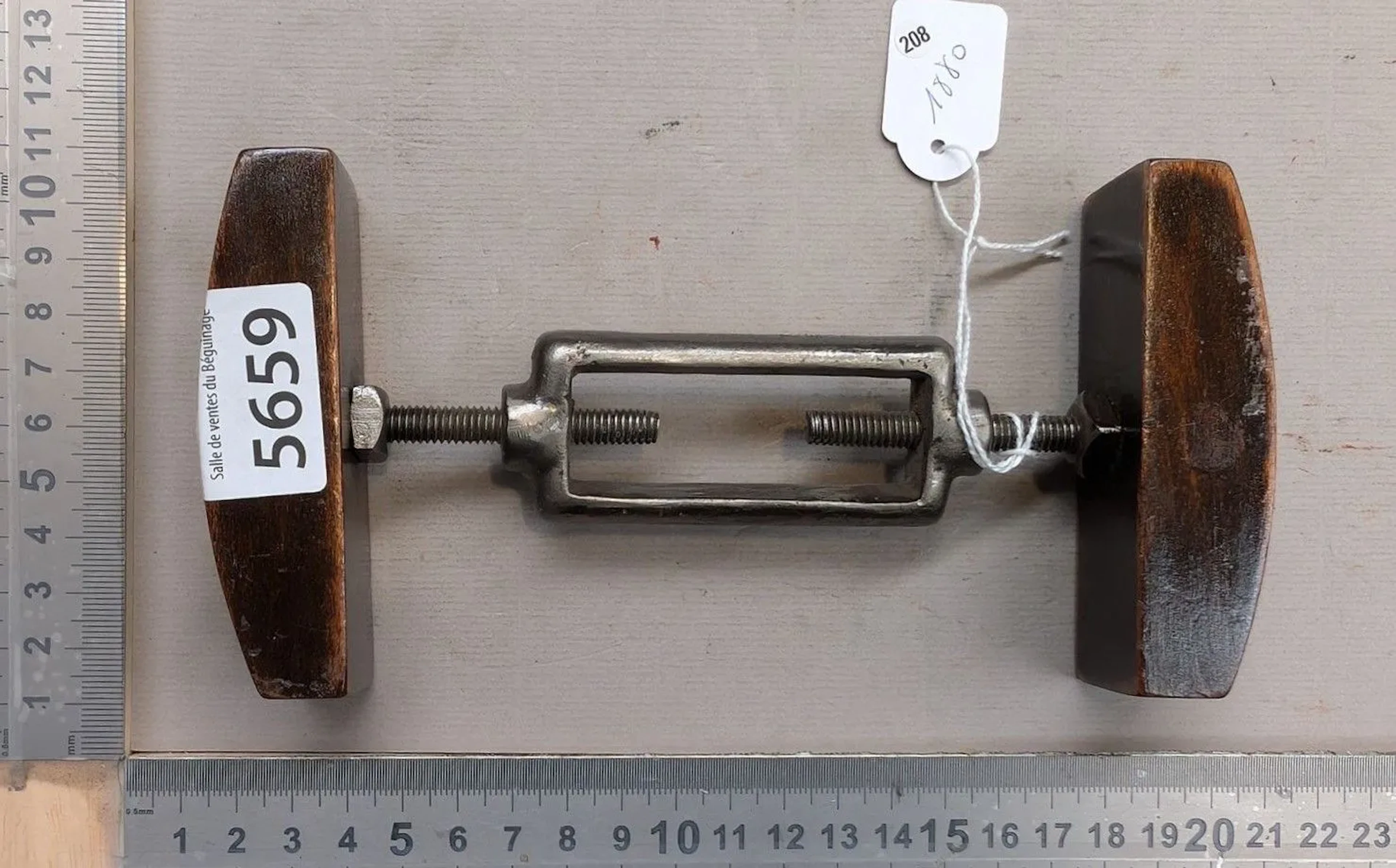 A hatmaker's tool—a hat shaper and stretcher—from 1880. See photos