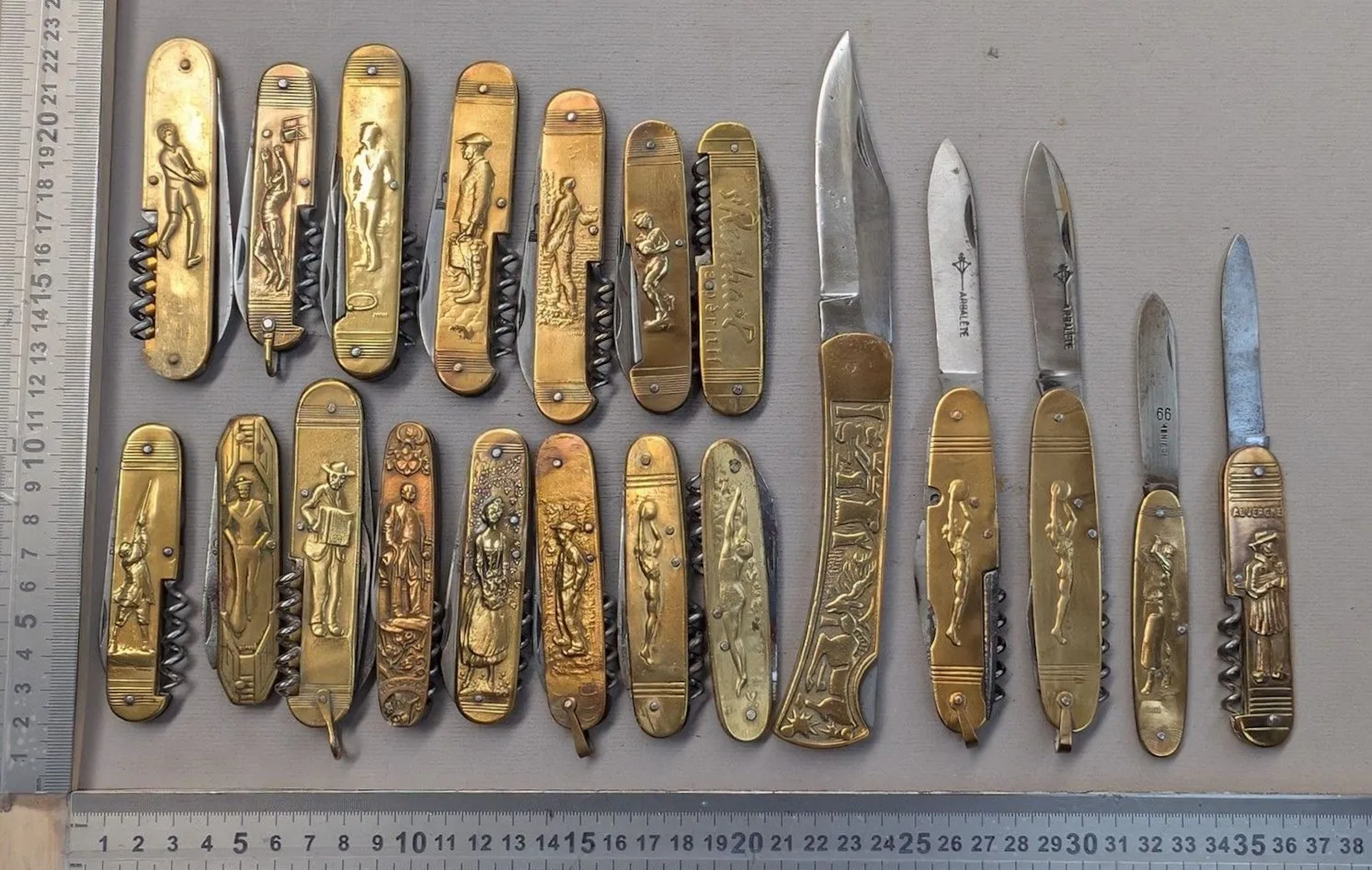 Set of 20 different antique pocket knives, with stamped brass handles