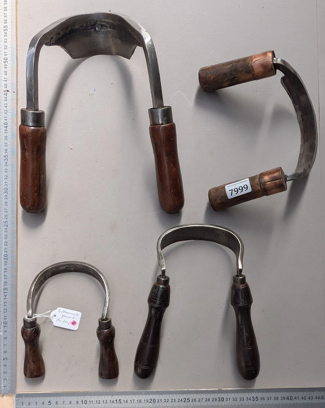 7 wrought-iron kneeling benches—see photos for dimensions and condition