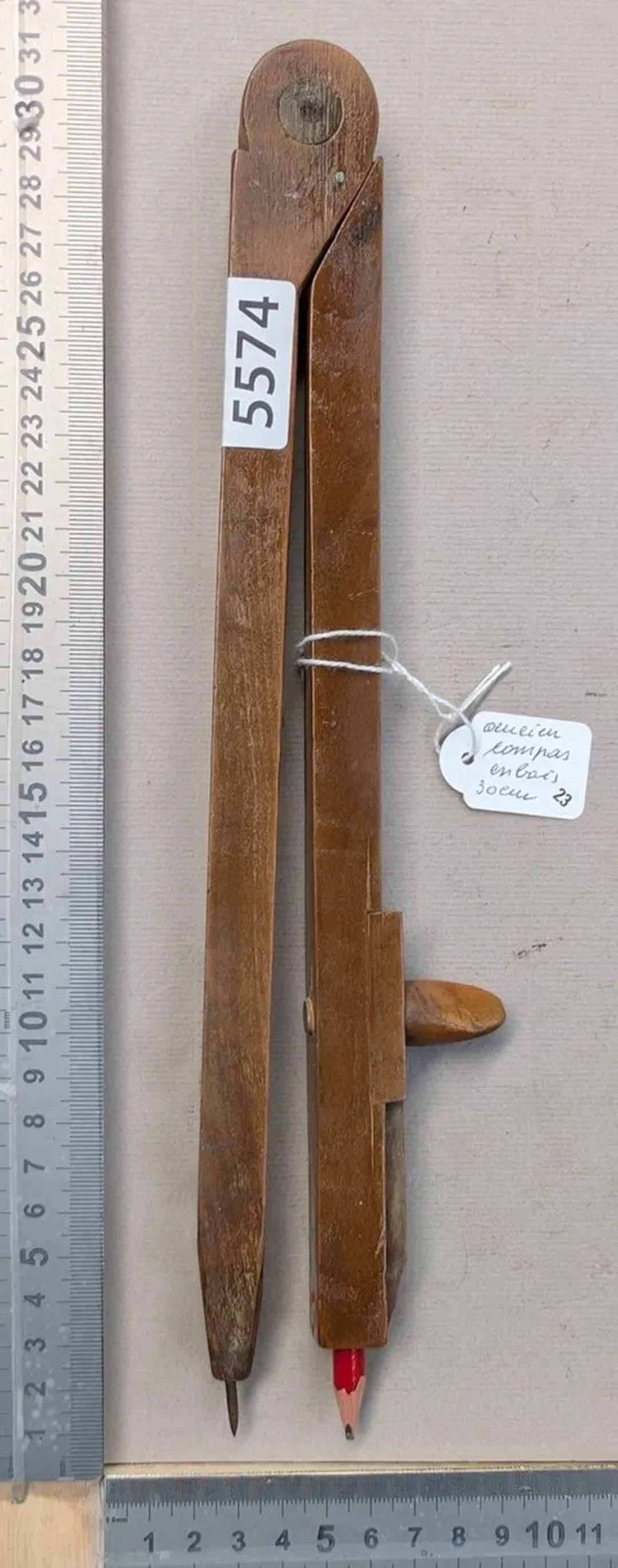 A very beautiful, thick wooden and brass compass—see photos for dimensions