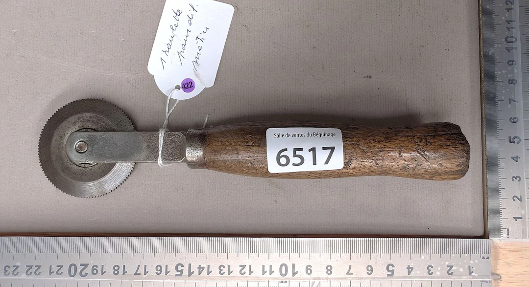 1 antique steel castor for various trades—see photos for dimensions