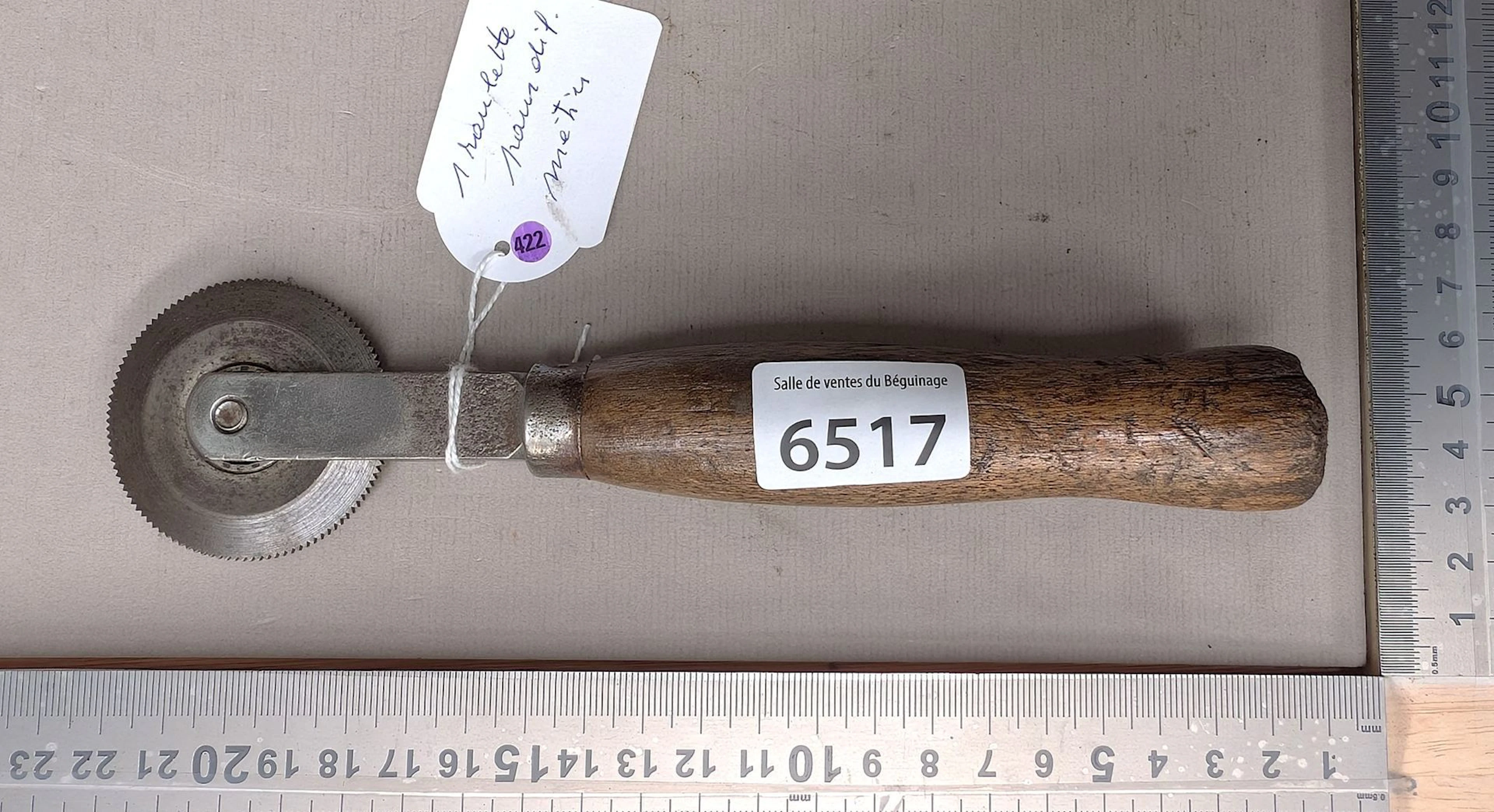1 antique steel castor for various trades—see photos for dimensions
