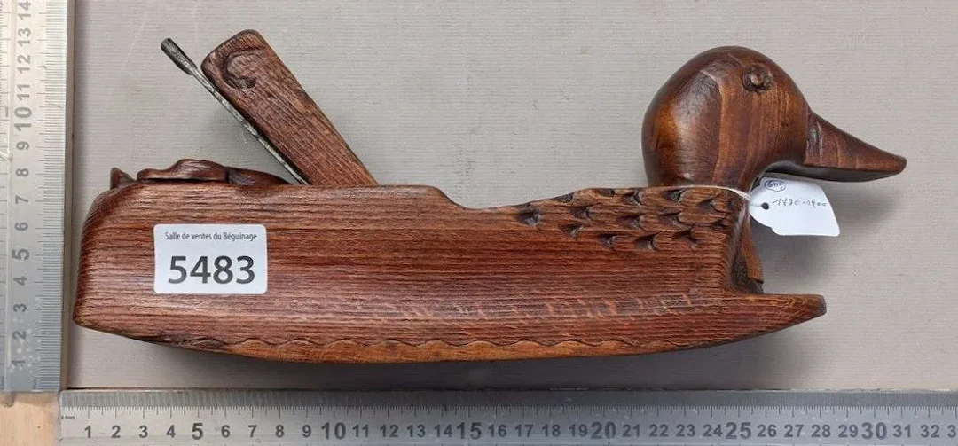 Functional decorative wooden plane, carved in the shape of a duck