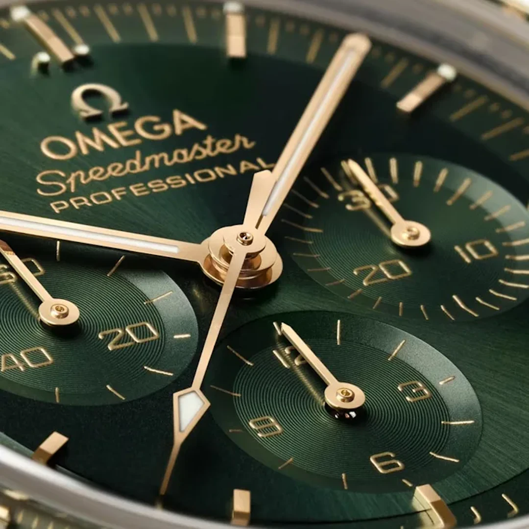 Omega Speedmaster Moonwatch 18k gold with green dial 310.60.42.50.10.001