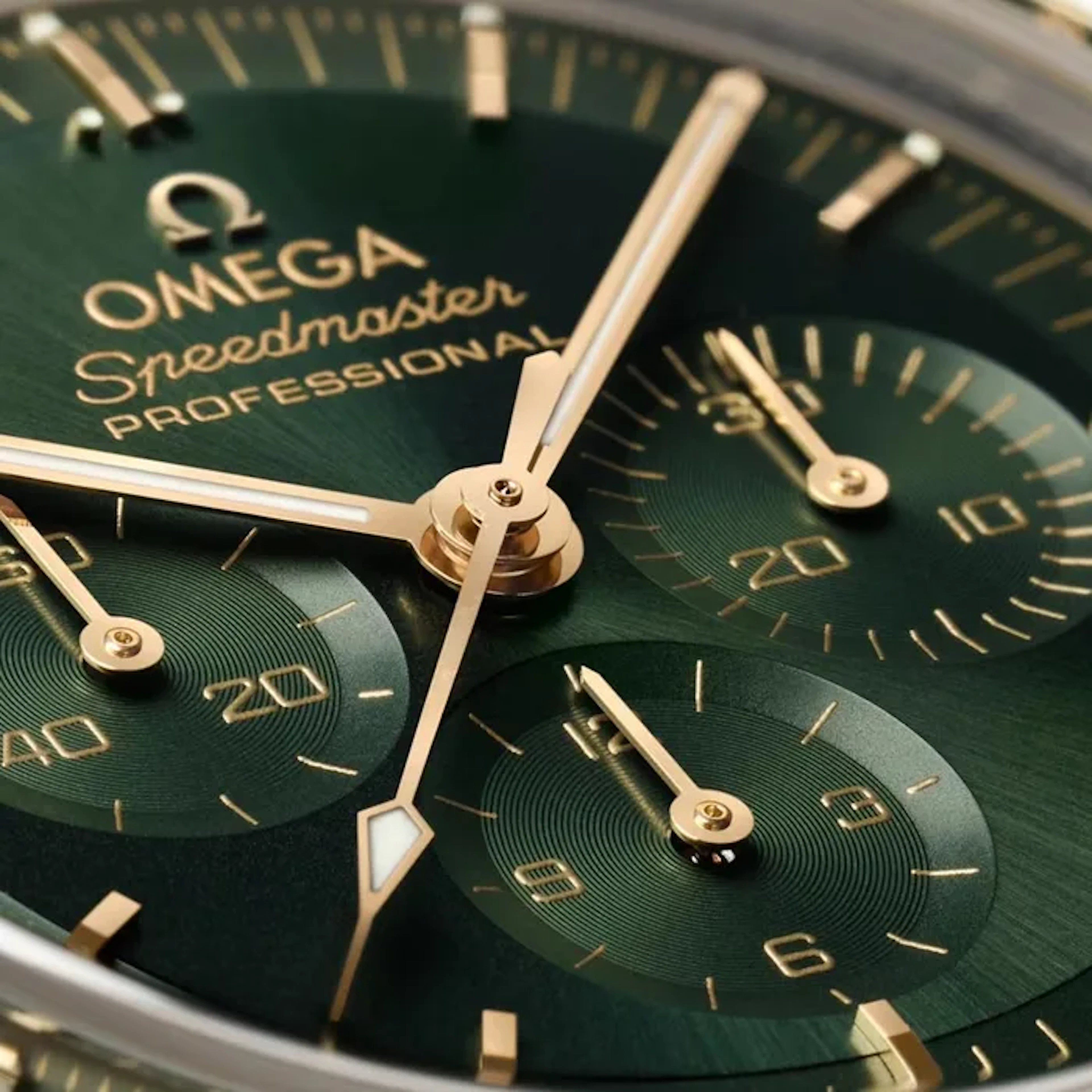 Omega Speedmaster Moonwatch 18k gold with green dial 310.60.42.50.10.001