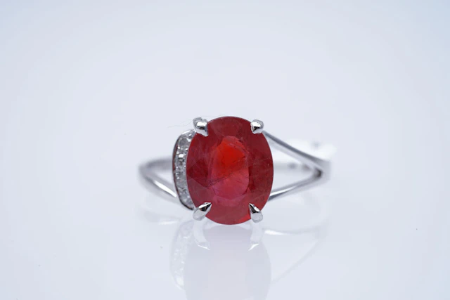 RING white GOLD 375 / 1000 orange SAPPHIRE ( 3,54 ) DIAMONDS ( 0,04