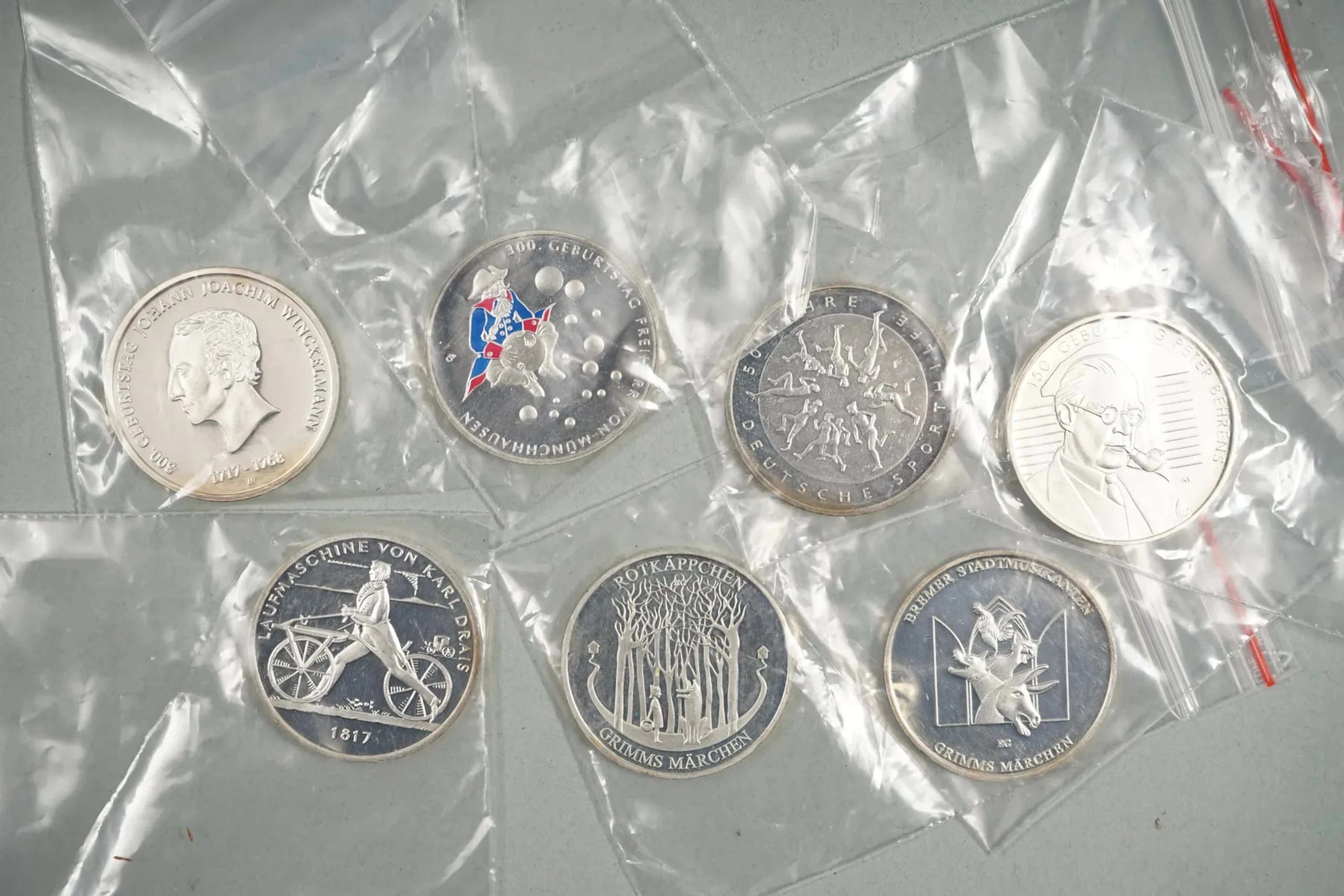7 kpl 20€ hopeakolikoita, Saksa