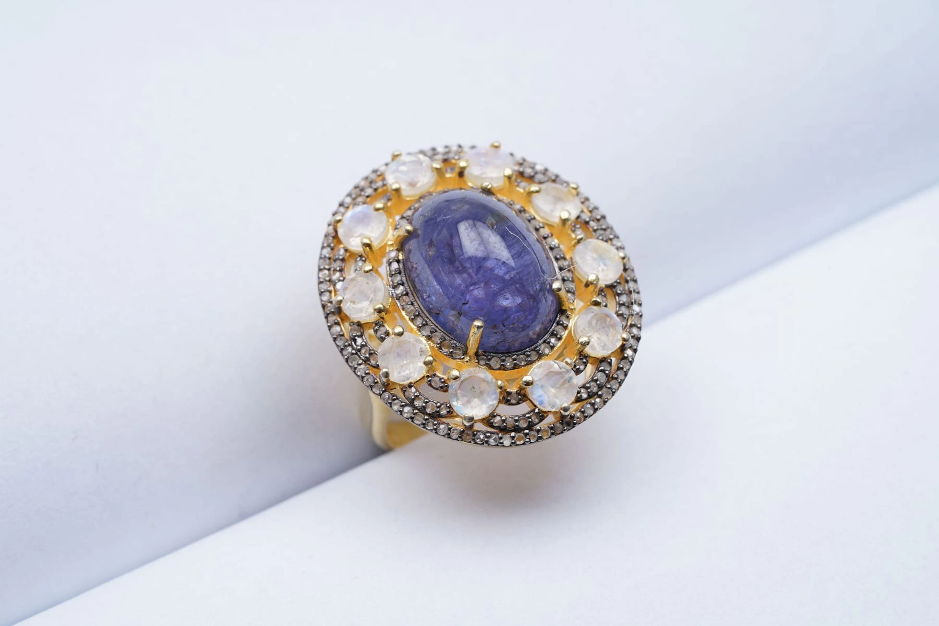 (3523) RING SILVER 925 / 1000 TANZANITE ( 11 ) OPALS ( 2,7 ) DIAMONDS