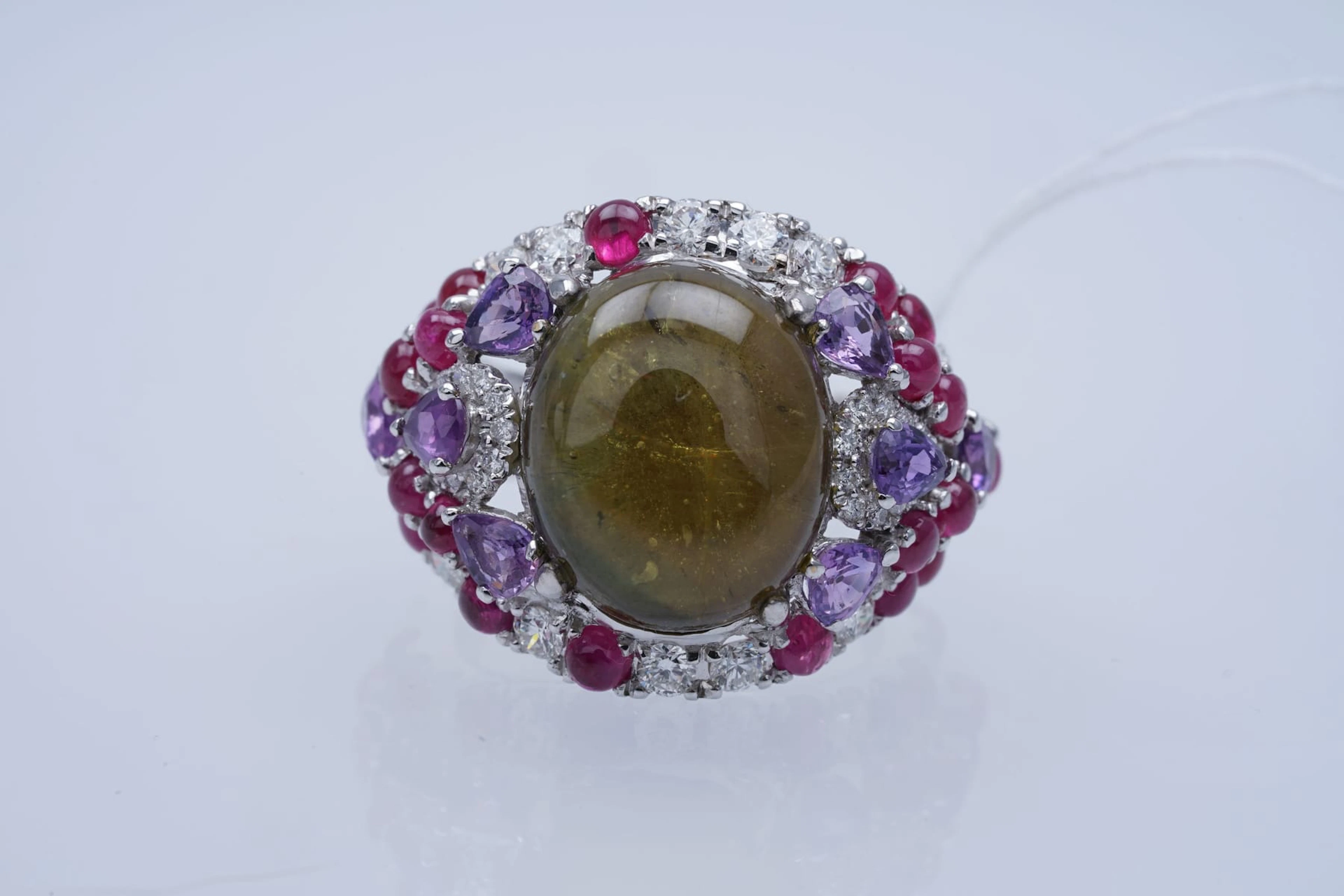 Sormus valkokultaa 750/1000, yellow SAPPHIRE cabochon treated (16,77)