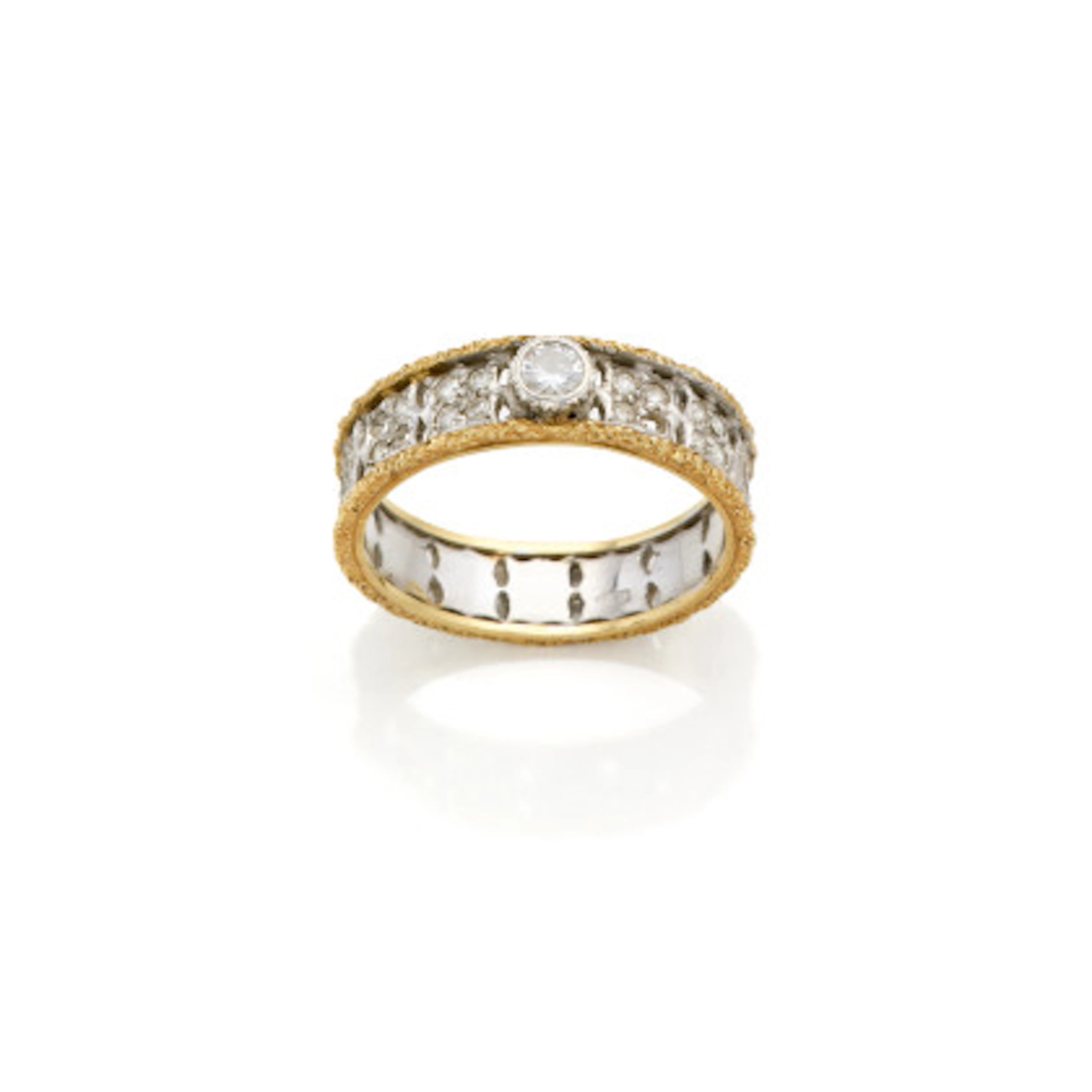 MARIO BUCCELLATI Anello a fascia in oro giallo e bianco cesellato