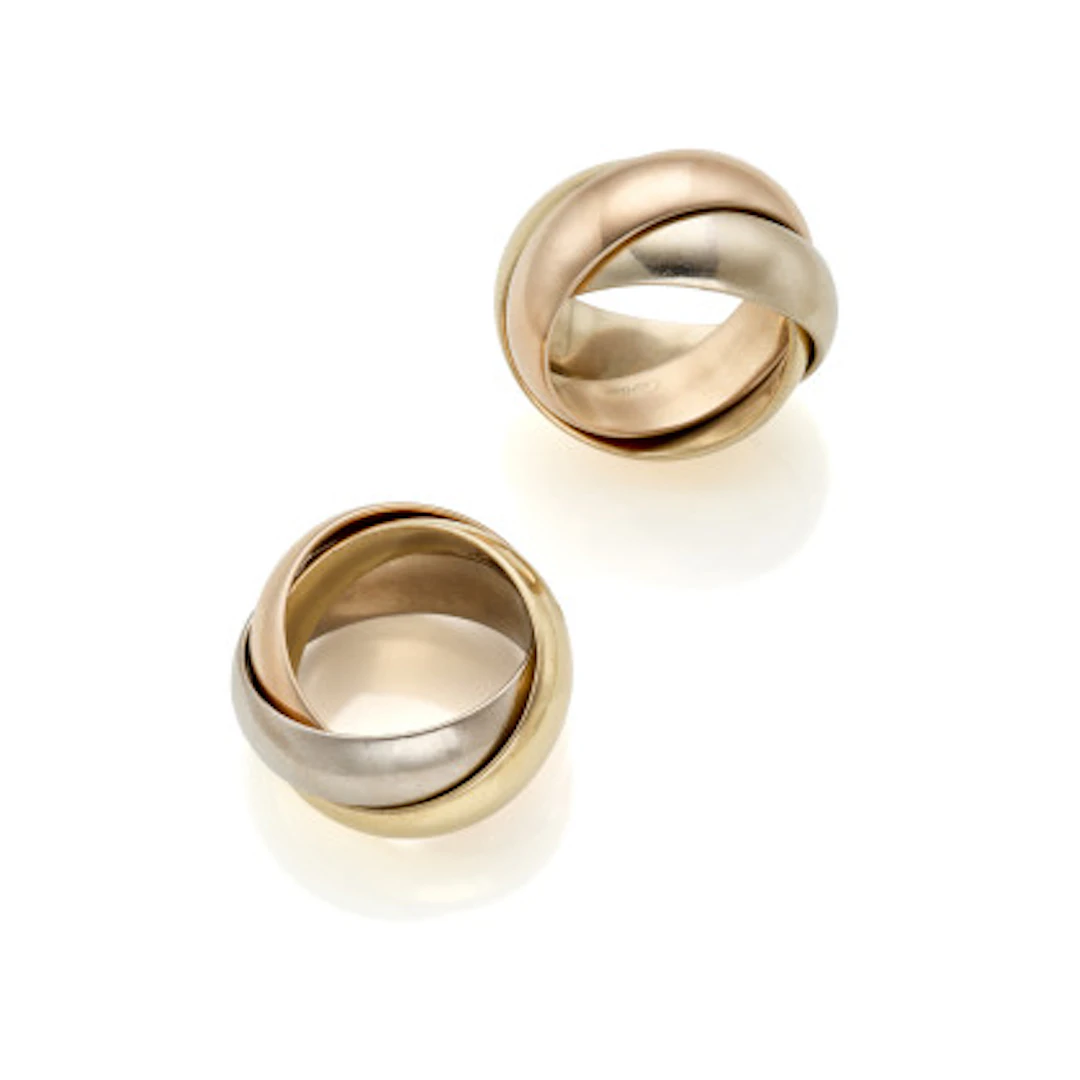 *CARTIER Lotto composto da due anelli "Trinity" in oro a tre colori