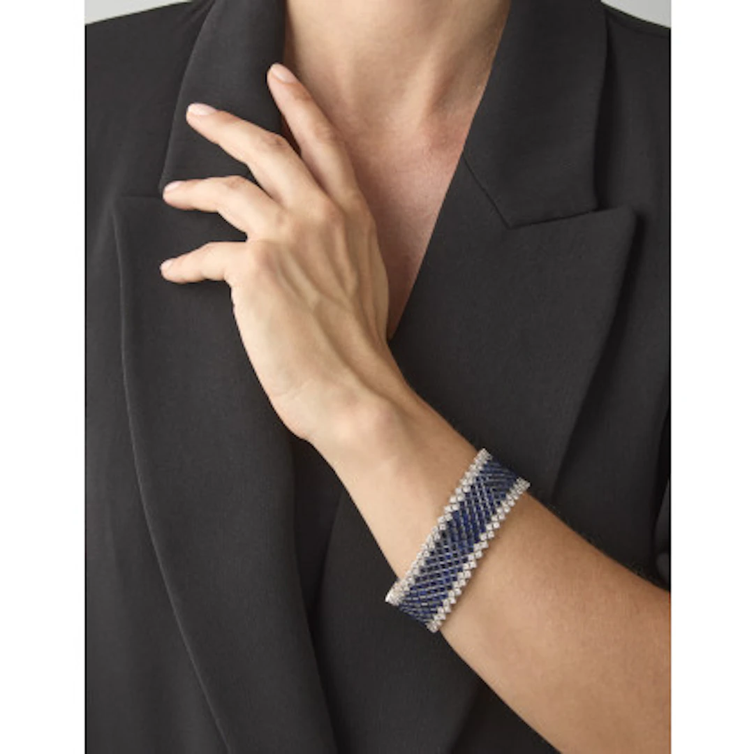 * Bracciale a fascia in oro bianco con diamanti tondi per complessivi