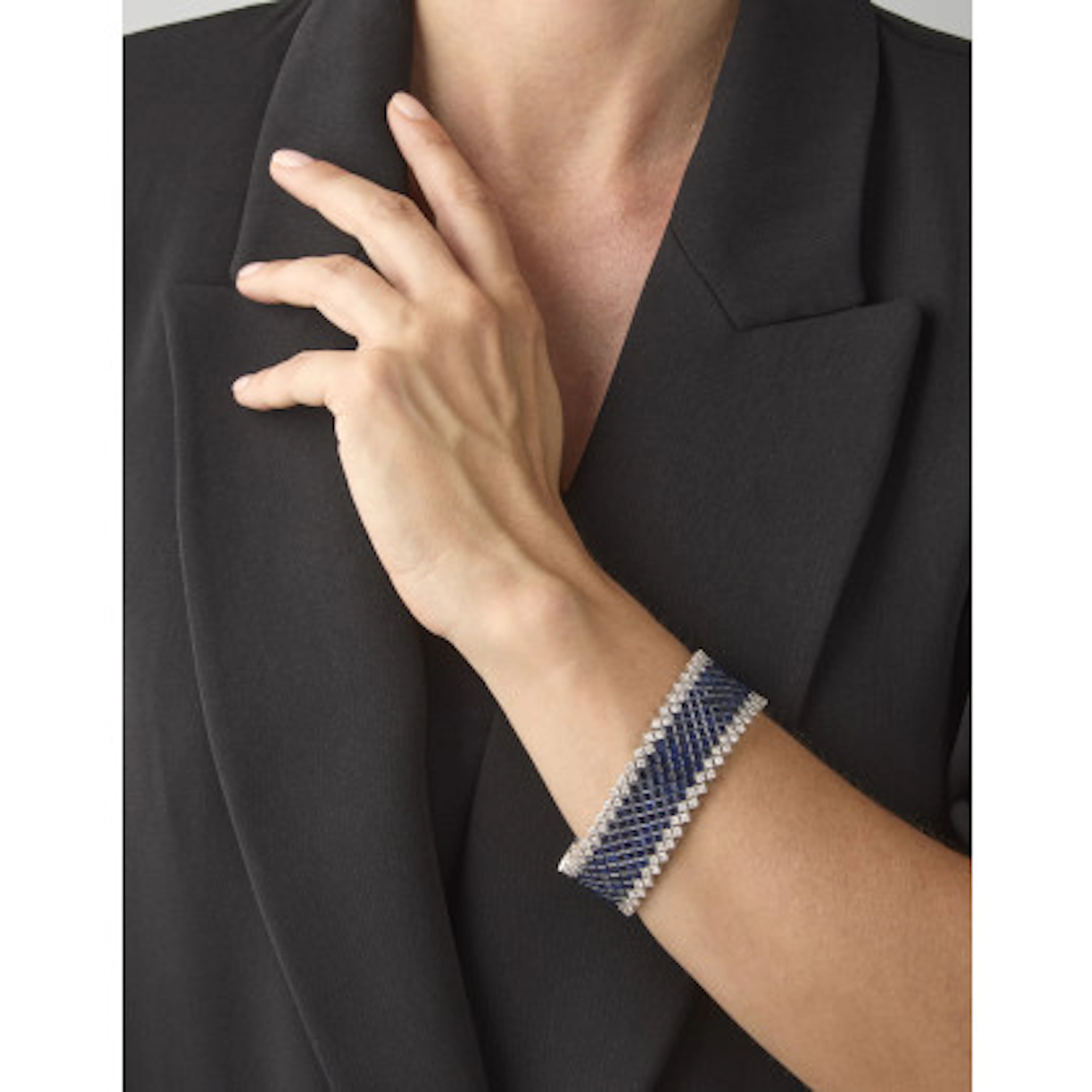 * Bracciale a fascia in oro bianco con diamanti tondi per complessivi