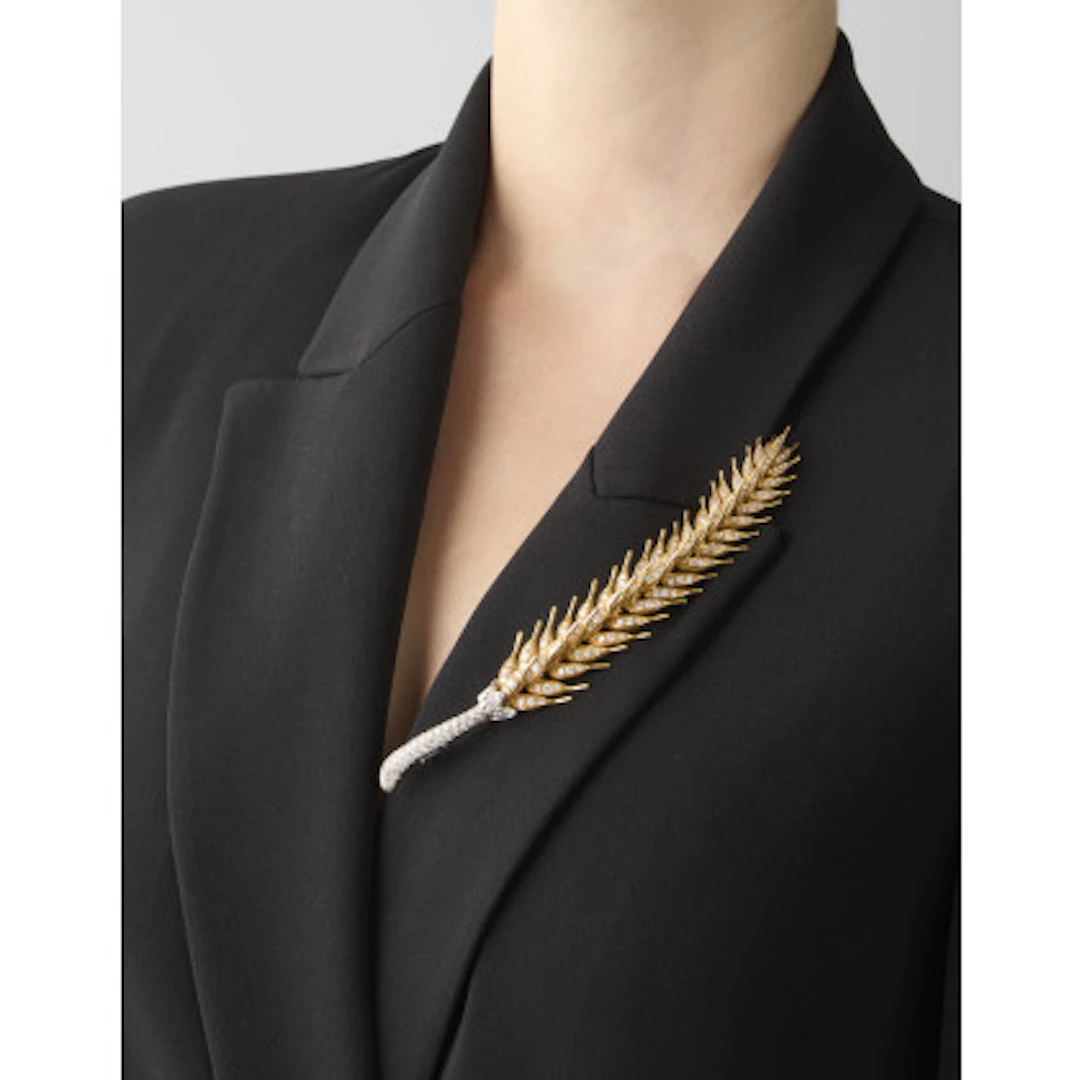 *MARTIGNETTI Broche a guisa di spiga articolata in oro giallo, platino