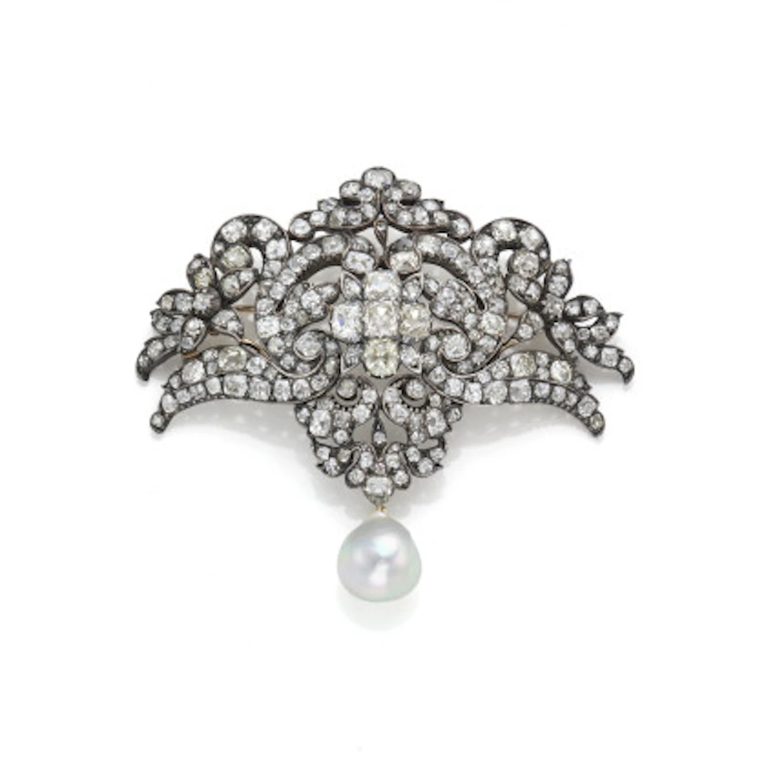 Spilla in argento e oro rosso 375/1000 con diamanti di vecchio taglio