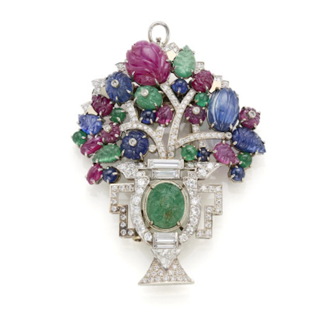 * Broche in stile "Tutti frutti" in oro bianco e diamanti a guisa