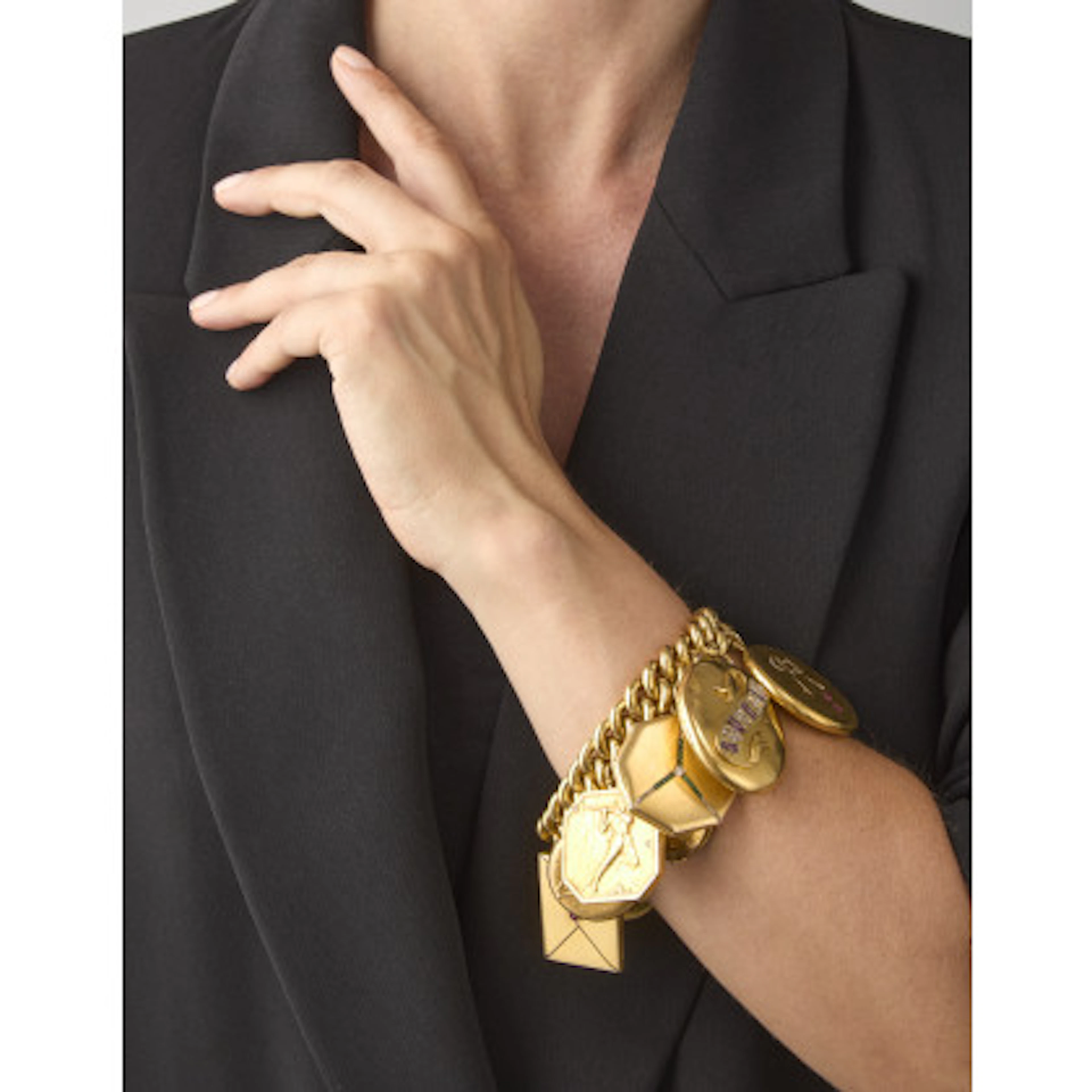 * Bracciale in oro giallo 750/1000 con charms portafoto in oro in