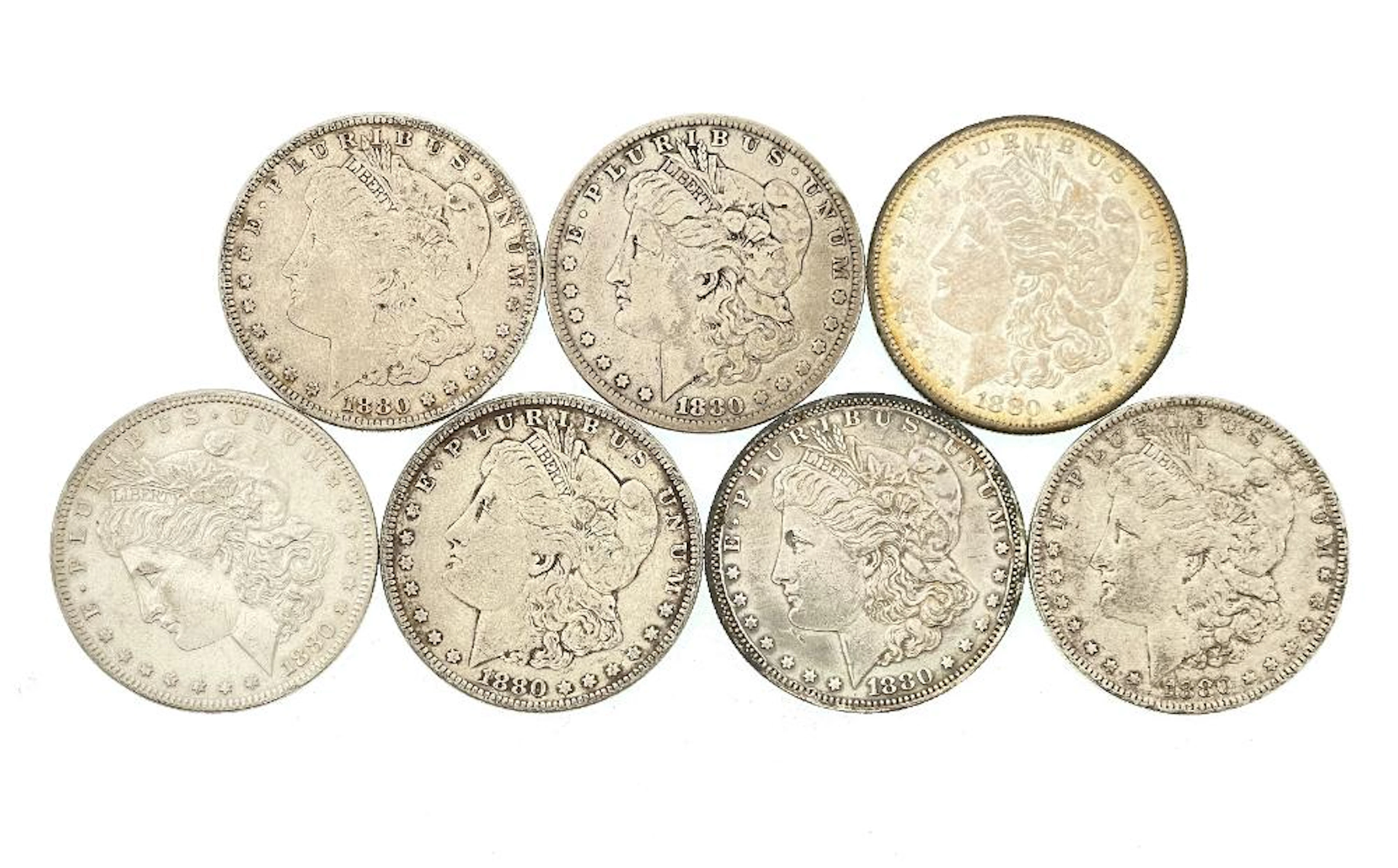 LOT OF 7 ASSORTED 1880 MORGAN SILVER DOLLARS