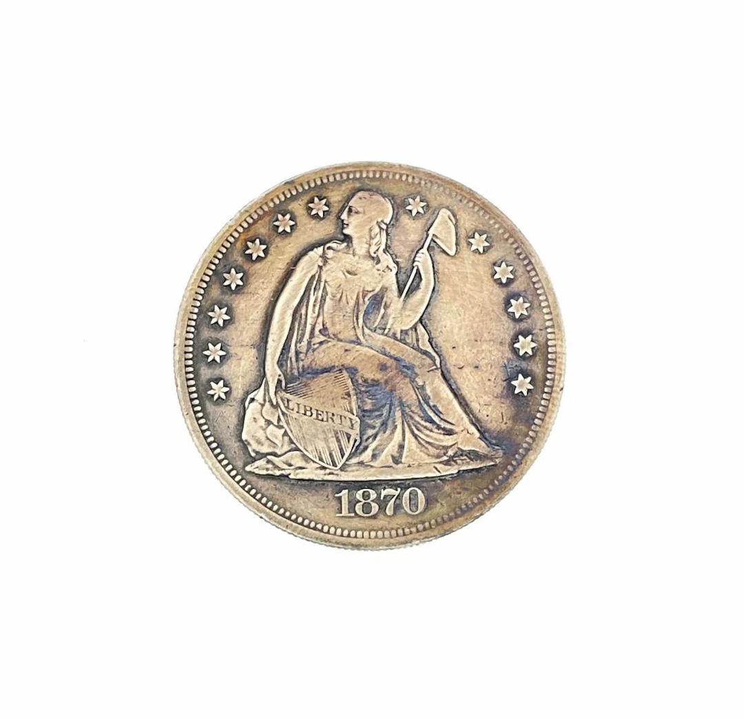1870-CC SEATED LIBERTY SILVER DOLLAR