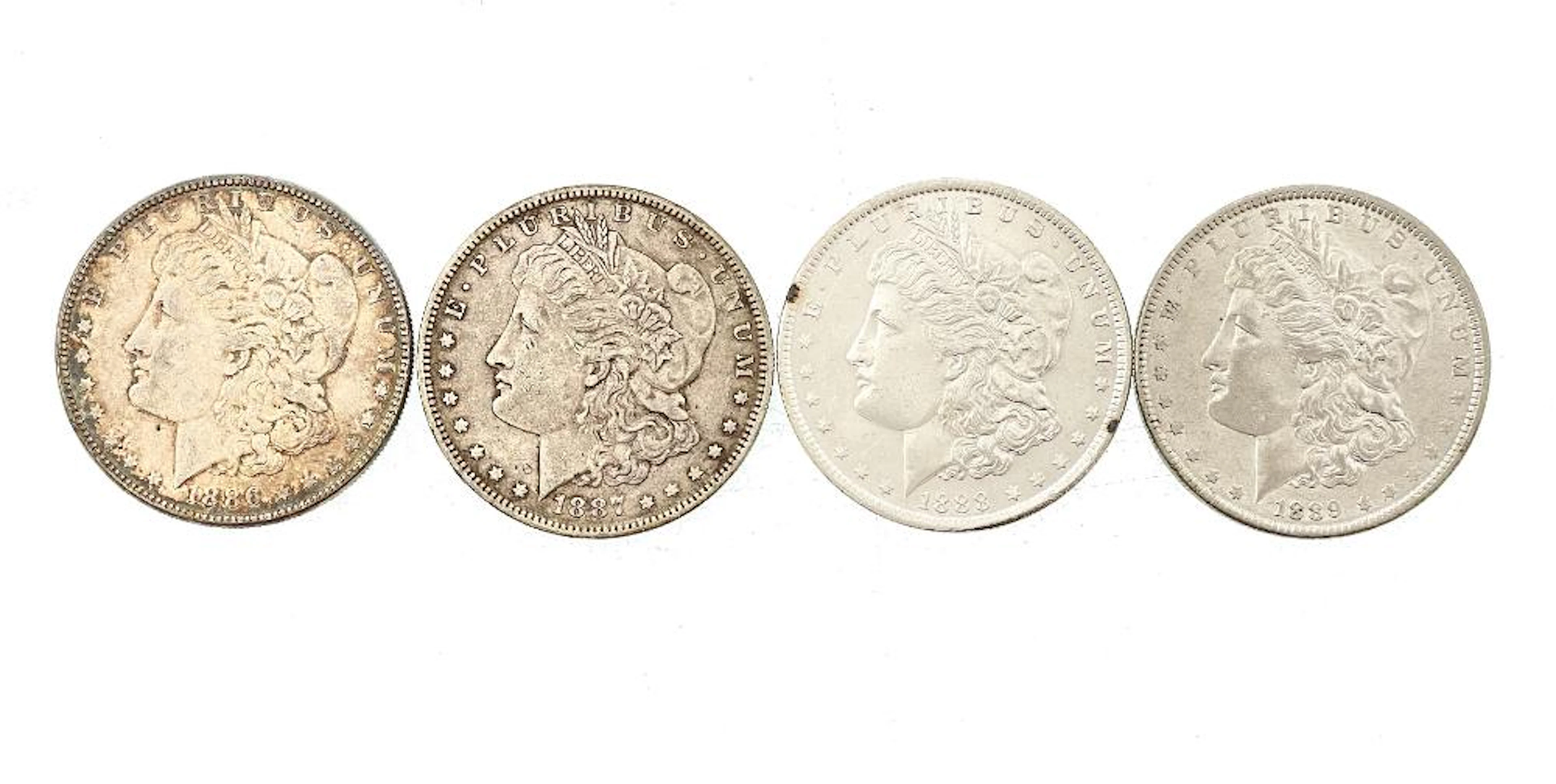 LOT OF 4 CONSECUTIVE 1886-1889 MORGAN SILVER DOLLARS