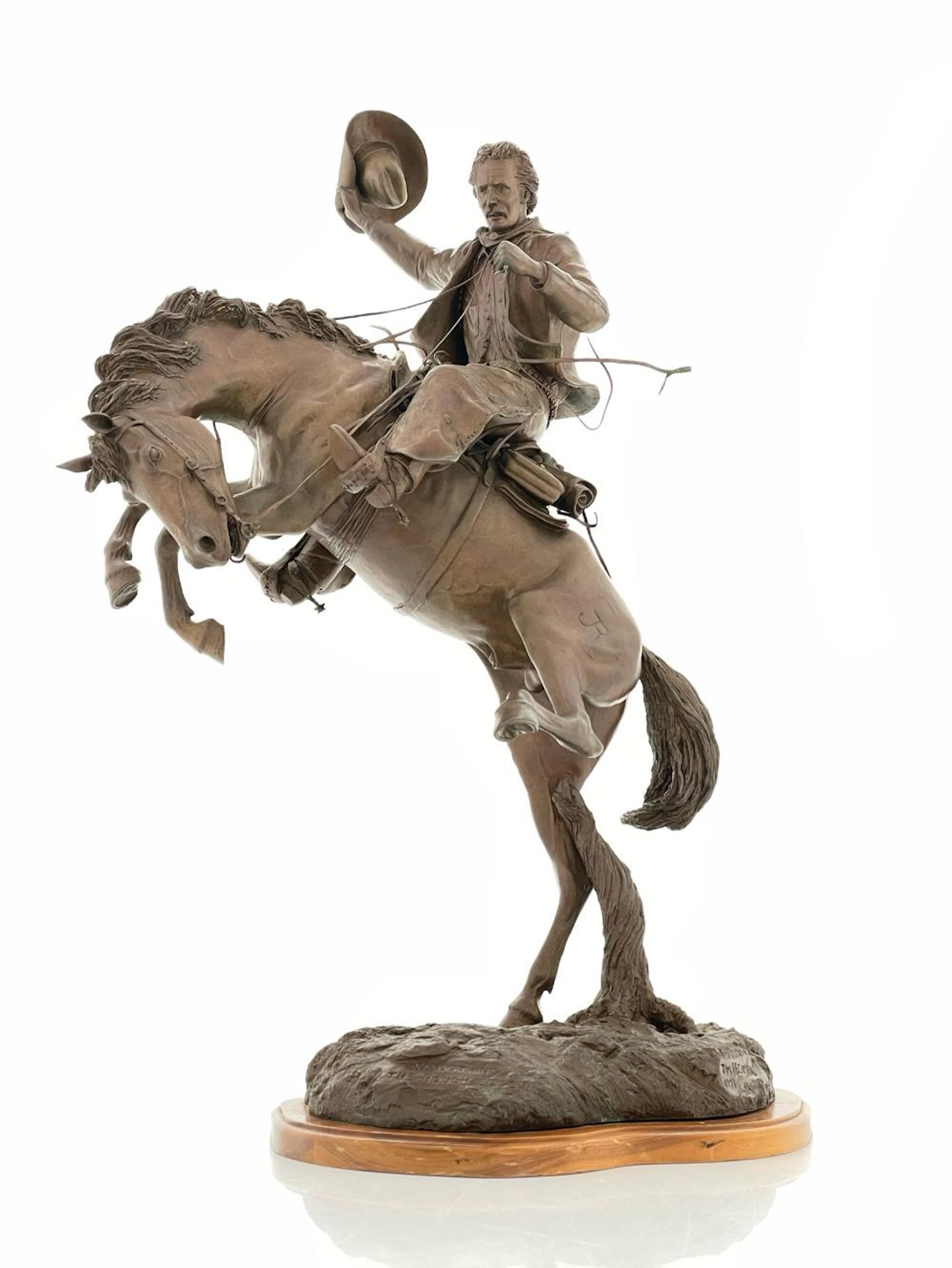 JAMES REGIMBAL "SMOOTHING THE ROUGH EDGES" BRONZE SCULPTURE