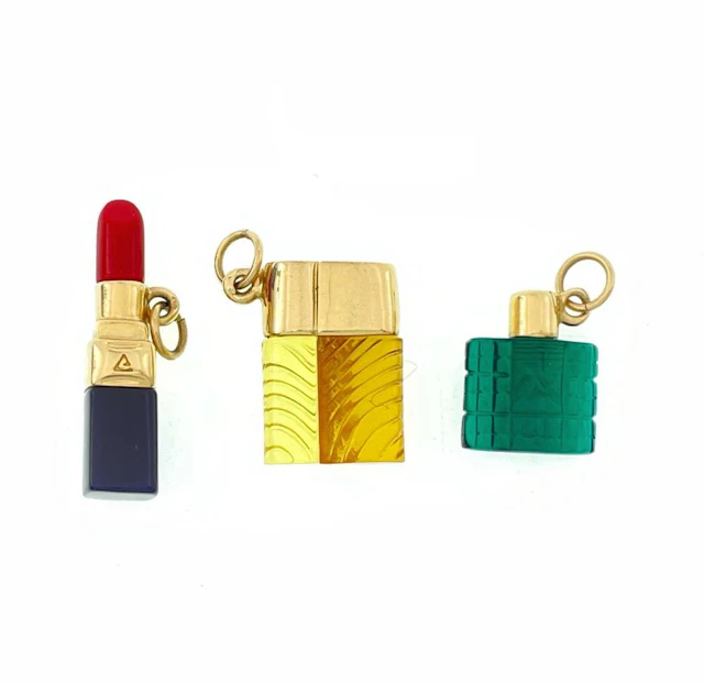LOT OF 3 AVON 14K YELLOW GOLD PLASTIC CHARMS