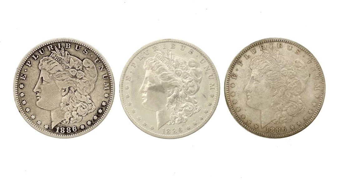LOT OF 3 1886-P-O-S MORGAN SILVER DOLLARS