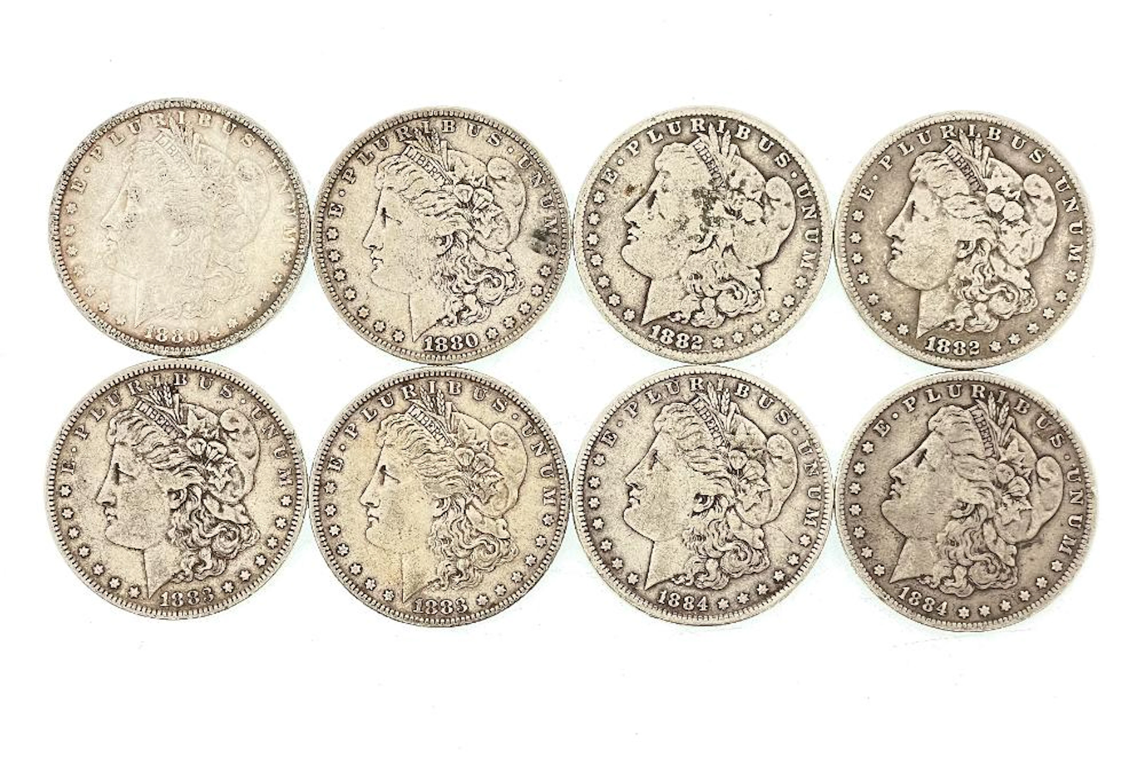 LOT OF 8 ASSORTED MORGAN SILVER DOLLARS