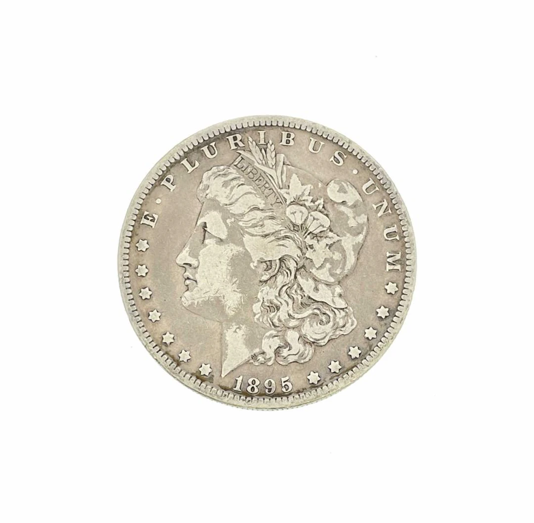 1895-O MORGAN SILVER DOLLAR