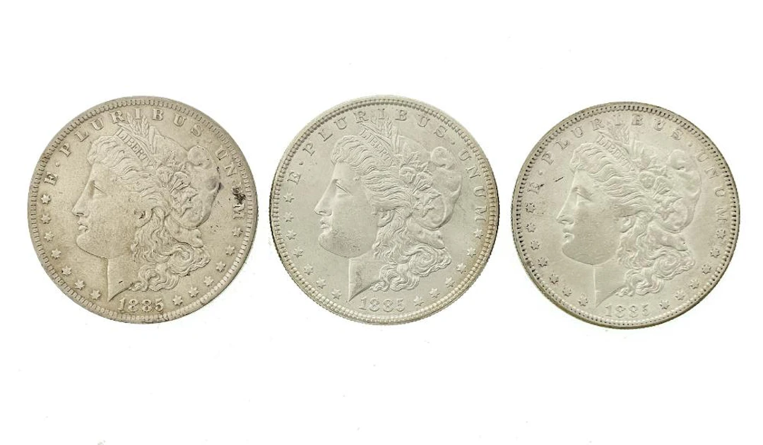 LOT OF 3 1885-P-O-S MORGAN SILVER DOLLARS