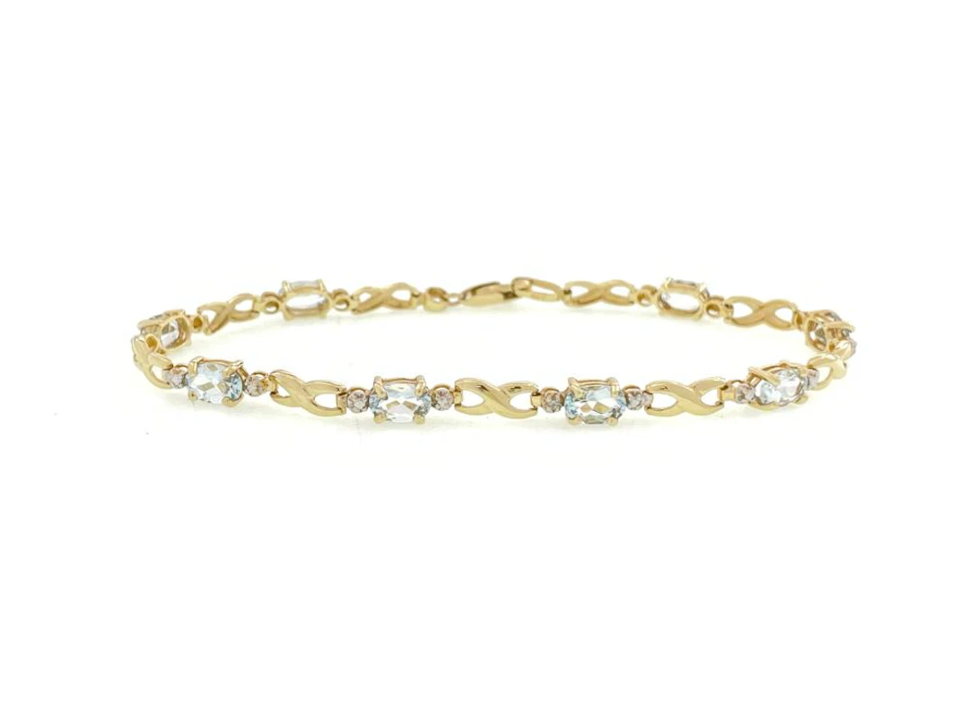 10K YELLOW GOLD AQUAMARINE INFINITY LINK BRACELET