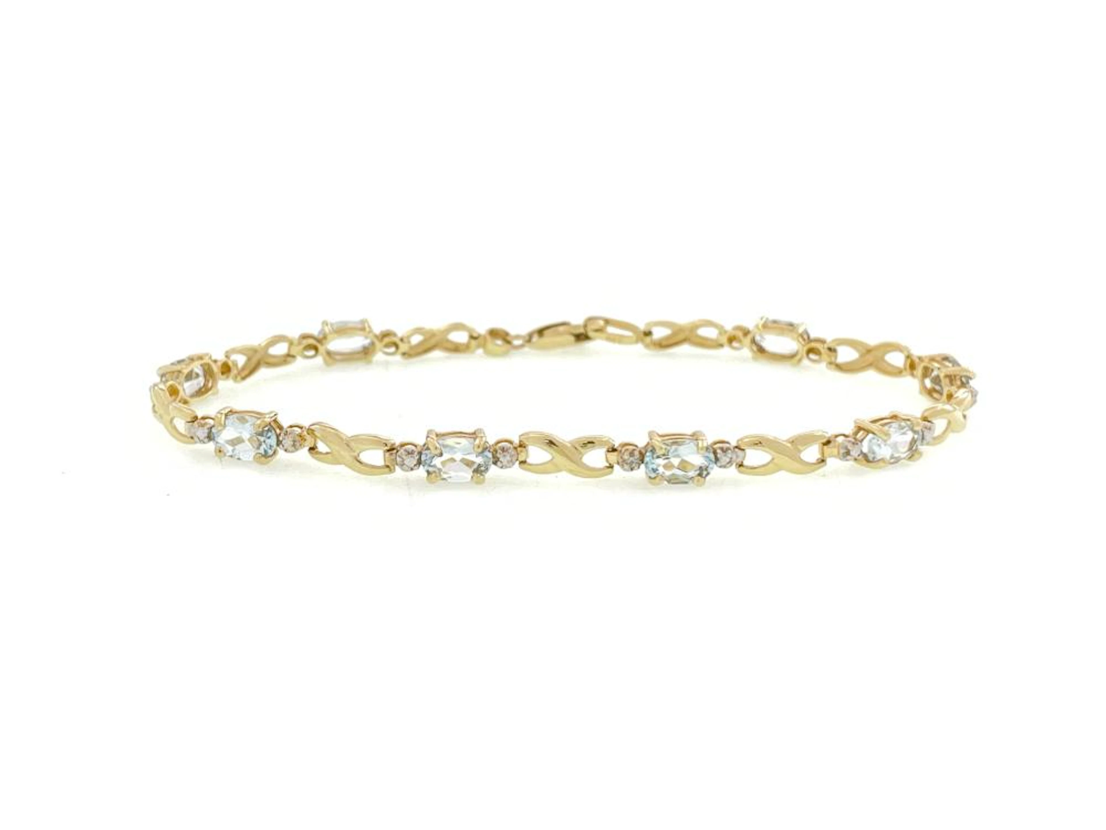 10K YELLOW GOLD AQUAMARINE INFINITY LINK BRACELET