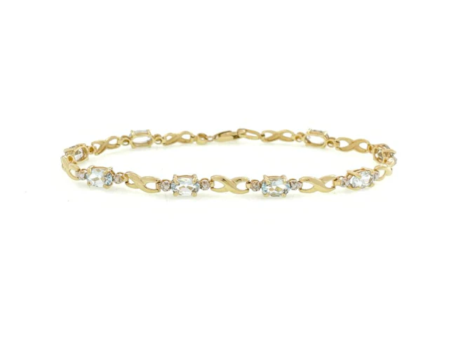 10K YELLOW GOLD AQUAMARINE INFINITY LINK BRACELET