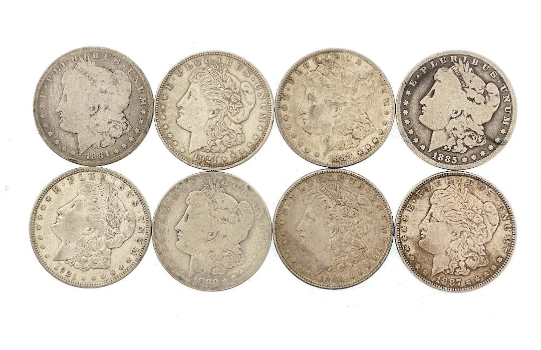 LOT OF 8 ASSORTED MORGAN SILVER DOLLARS