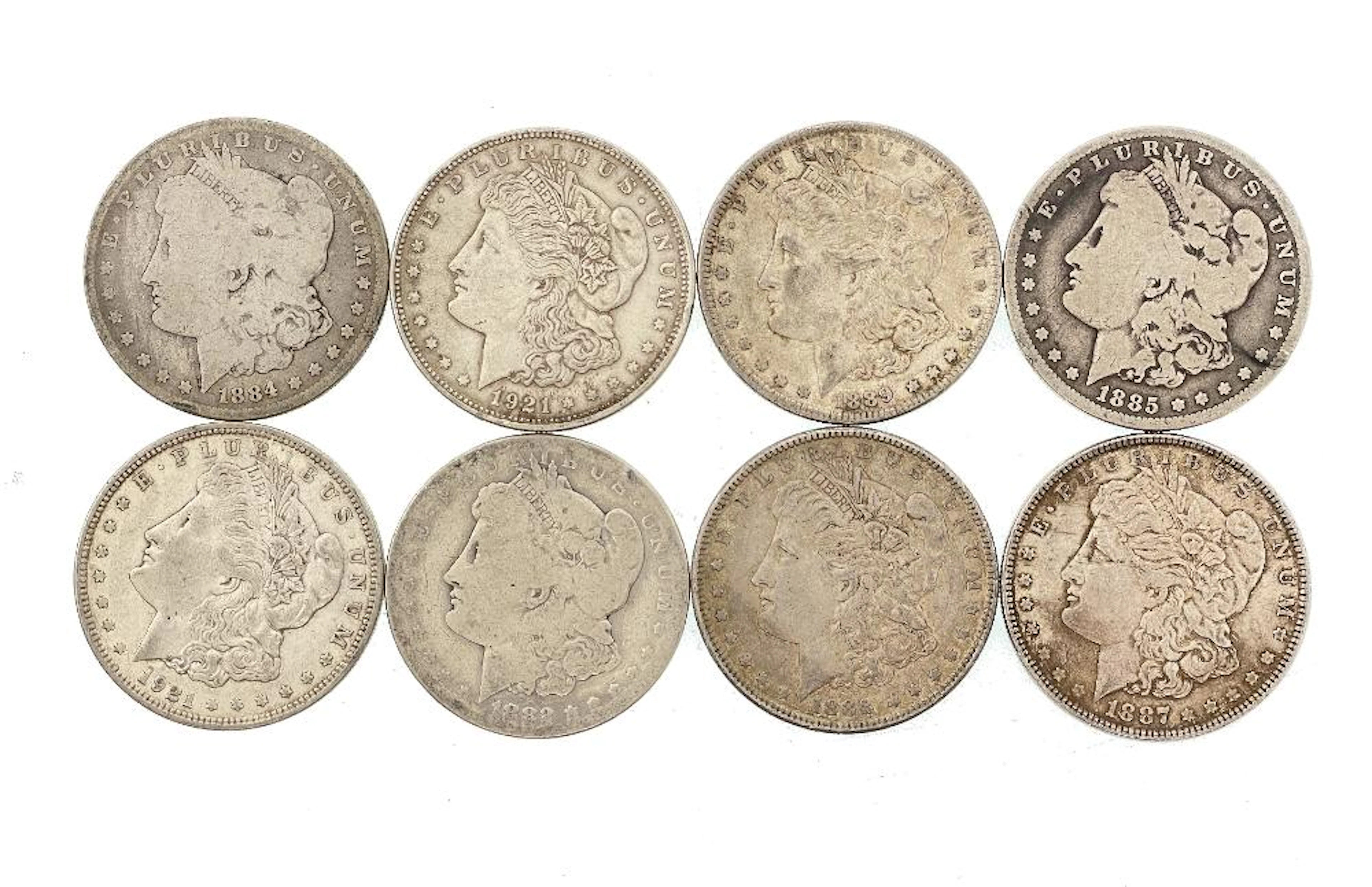 LOT OF 8 ASSORTED MORGAN SILVER DOLLARS