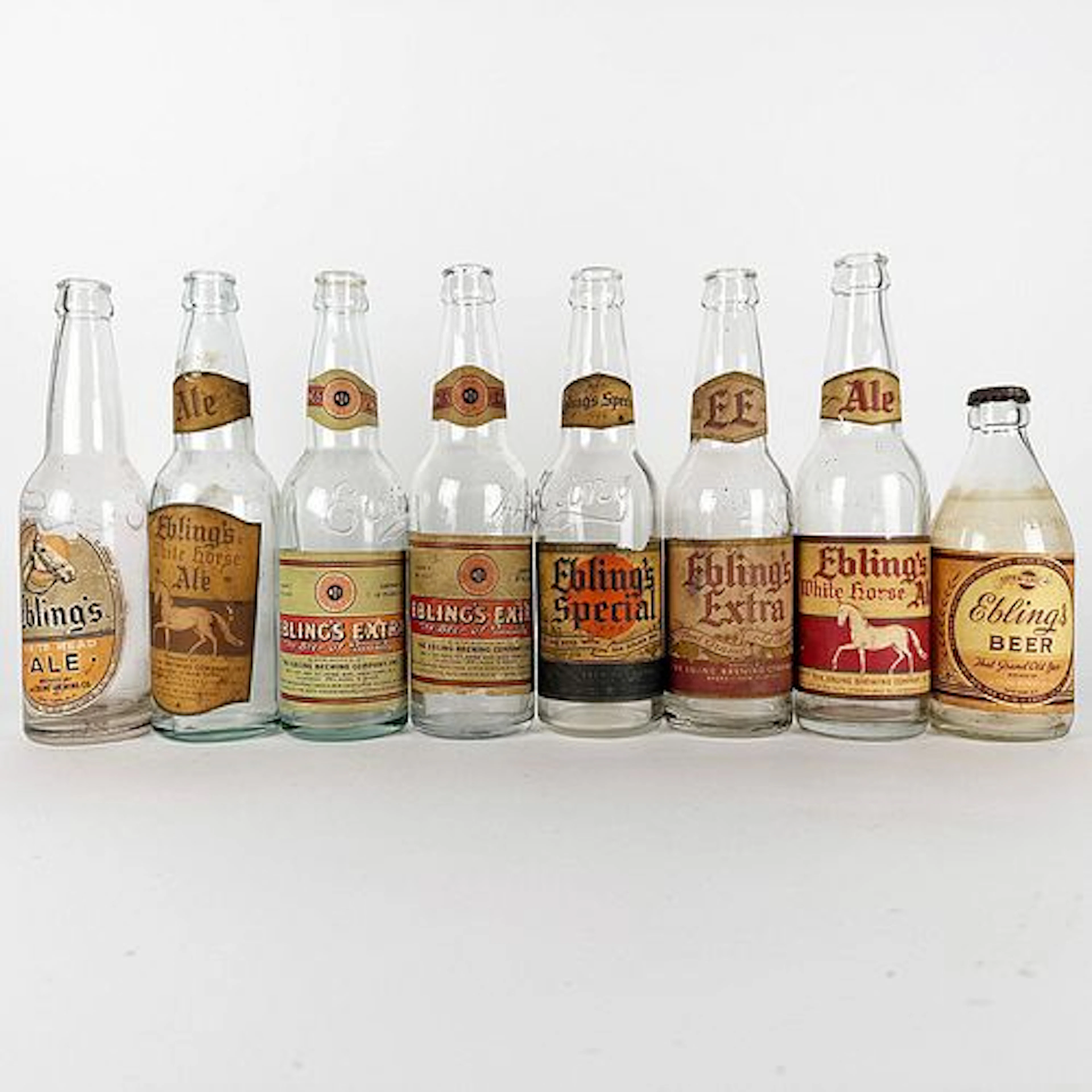 Eight Ebling’s Labeled Bottles: White Head, White Horse, Extra & Special
