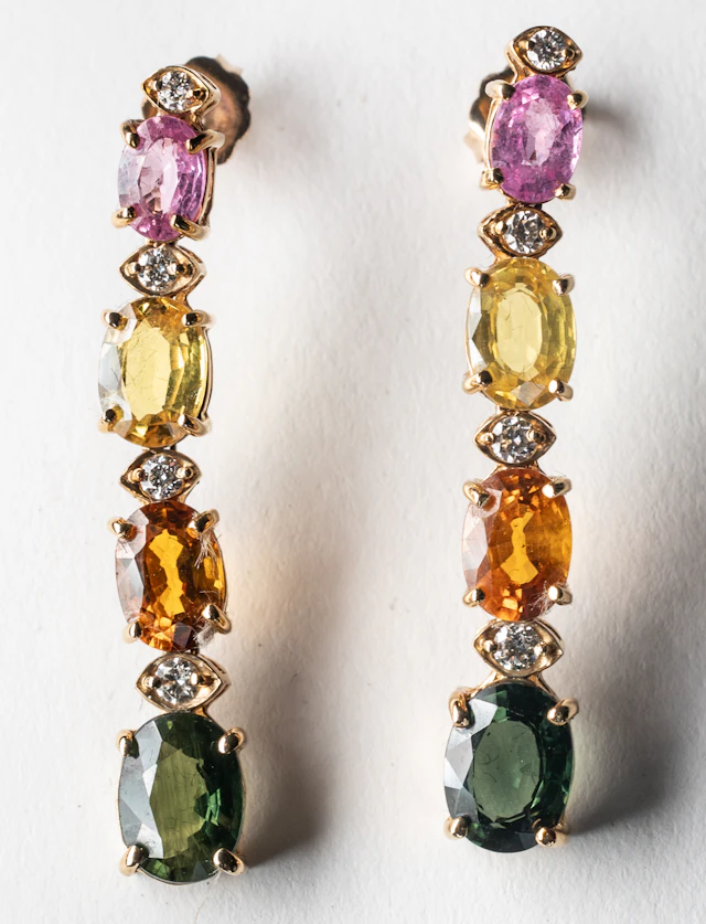 Lot 266: A PAIR GOLDEN EARRINGS WITH 8 NATURAL MULTI-COLOR SAPPHIRES