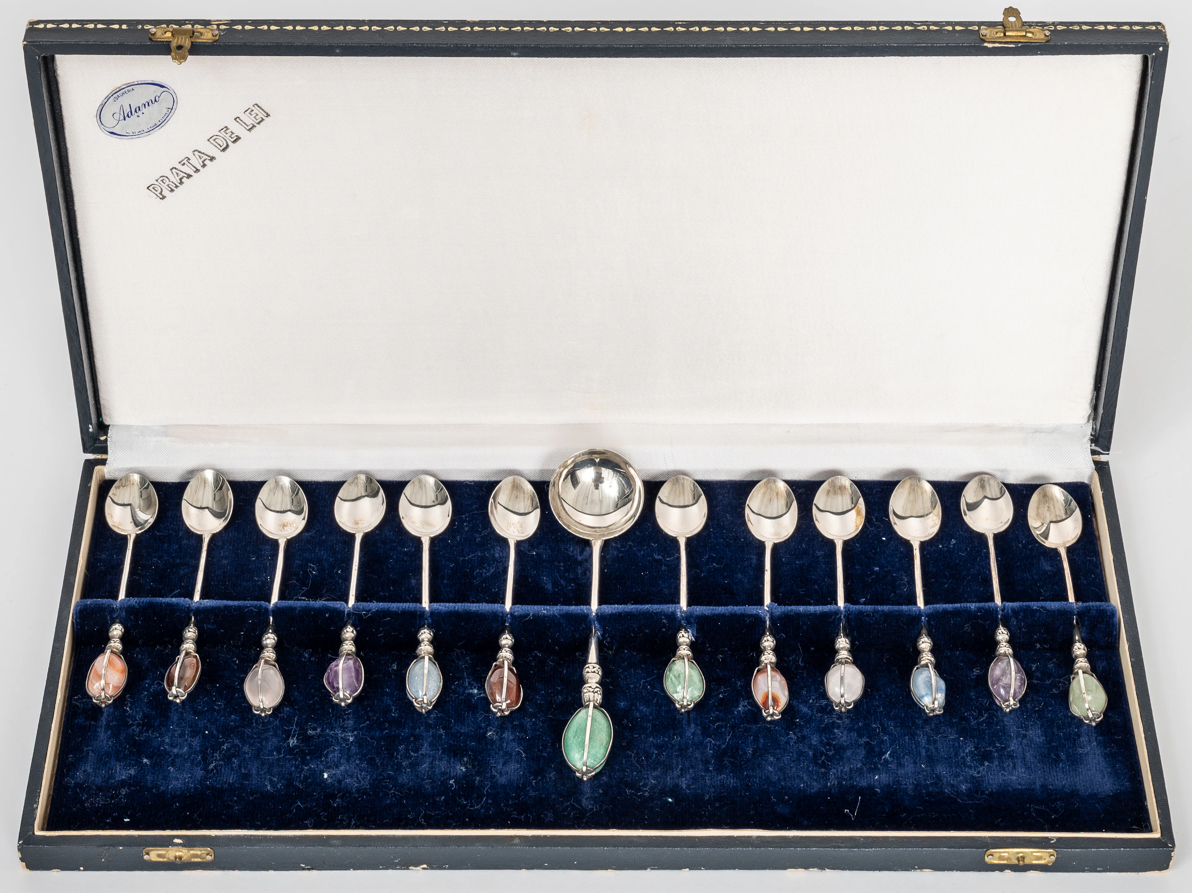 Lot 300: SILVER SPOORN SET COMPRISING 12 MOCHA SPOONS AND 1 LARGER