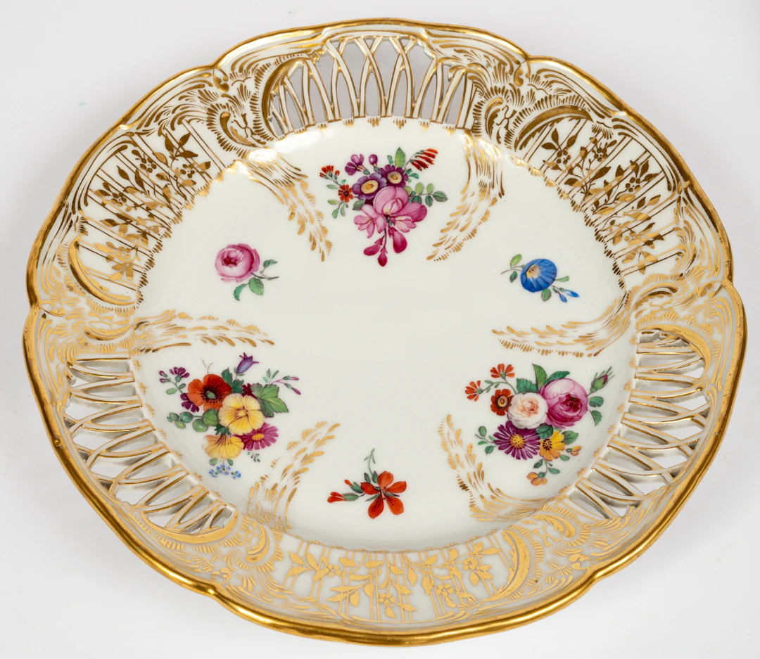 Lot 205: (137) KPM OPEN WORKED PLATE WITH FLORAL DECOR