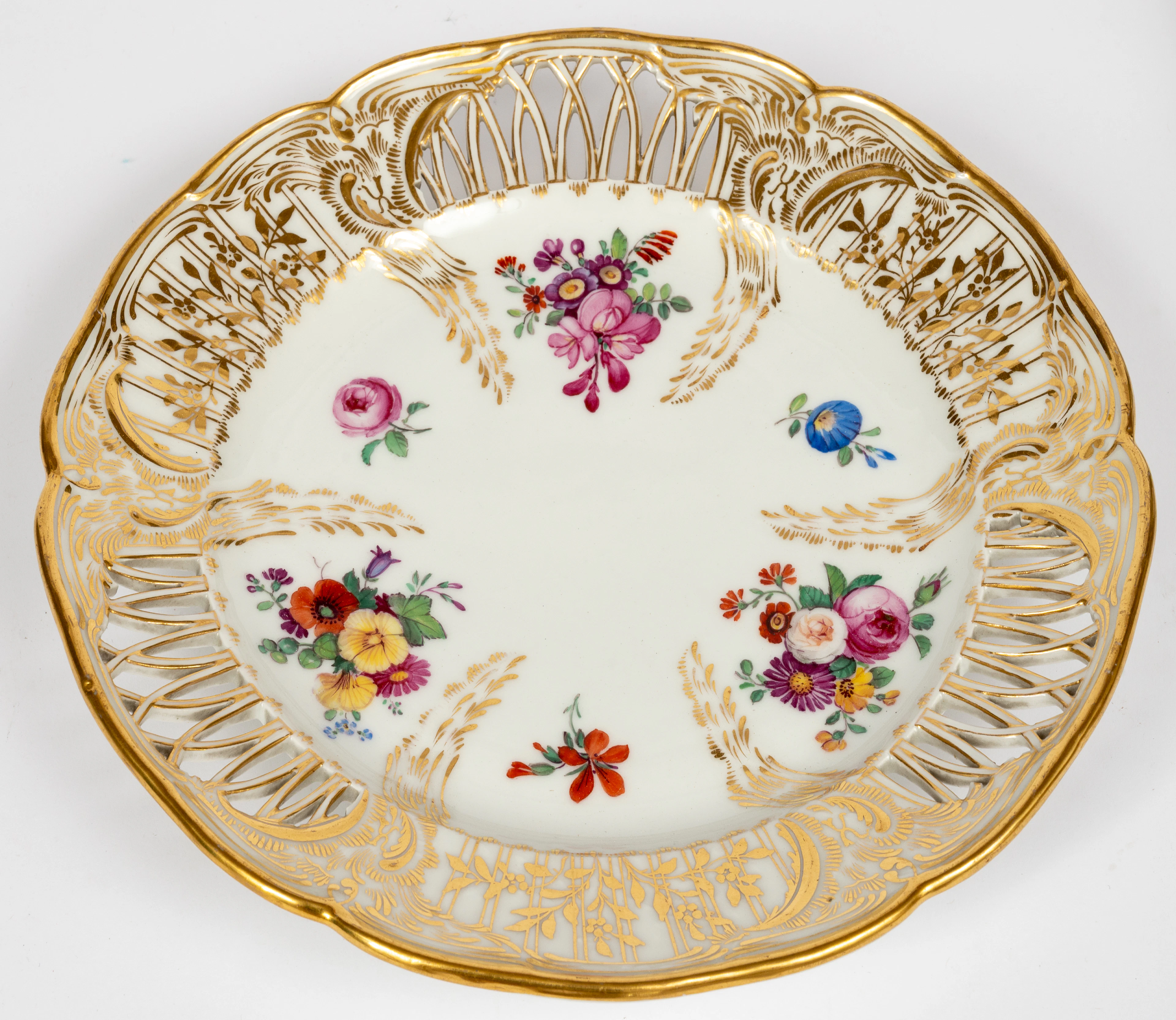 Lot 205: (137) KPM OPEN WORKED PLATE WITH FLORAL DECOR