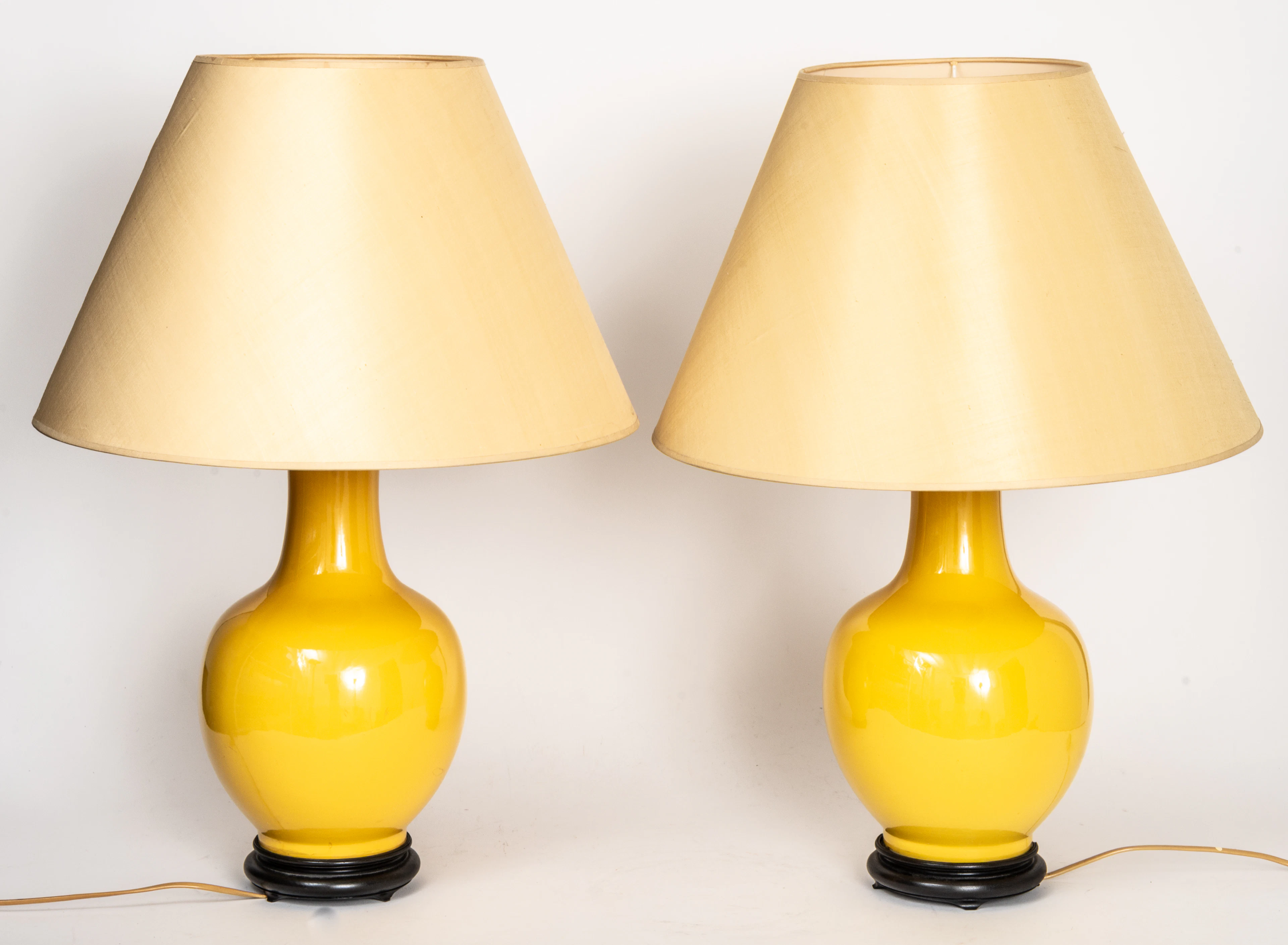 Lot 363: A PAIR OF YELLOW PORCELAIN VASE LAMPS