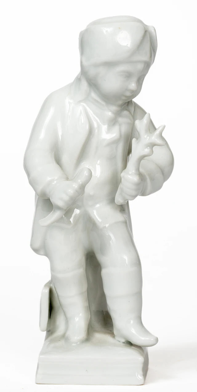 Lot 137: KPM PORCELAIN FIGURE SHOWING A YOUNG MEN AS A GARDENER
