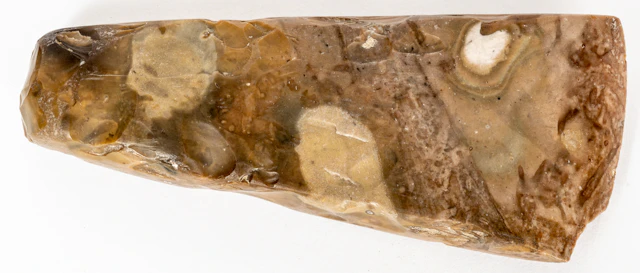 Lot 69: A NEOLITHIC STONE HANDAXE