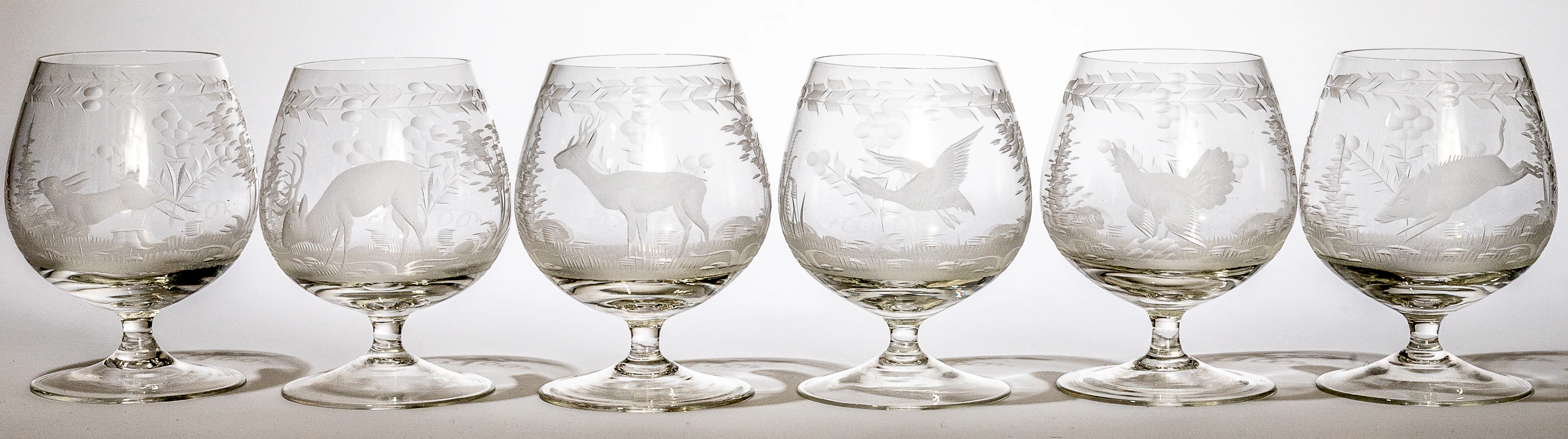 Lot 99: 6 COGNAC GLASSES WITH HUNTING AND WILDLIFE MOTIFS