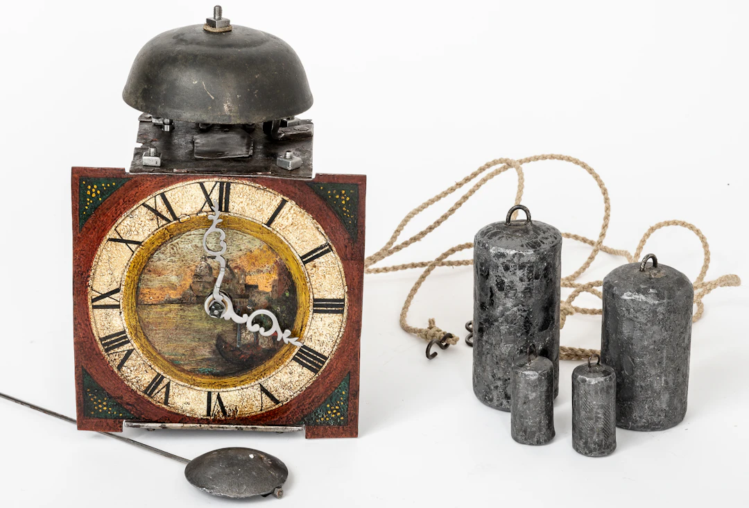 Lot 316: IRON CLOCK