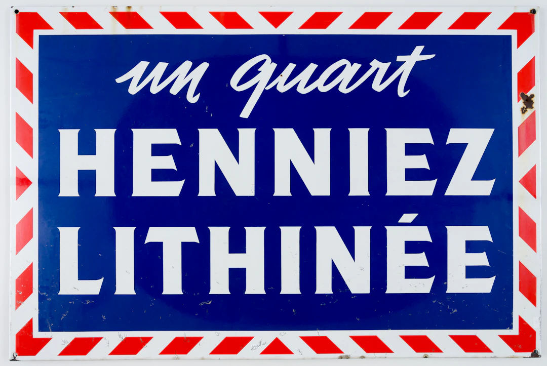 Lot 386: ENAMEL SIGN FOR HENNIEZ LITHINEE MINERAL WATER