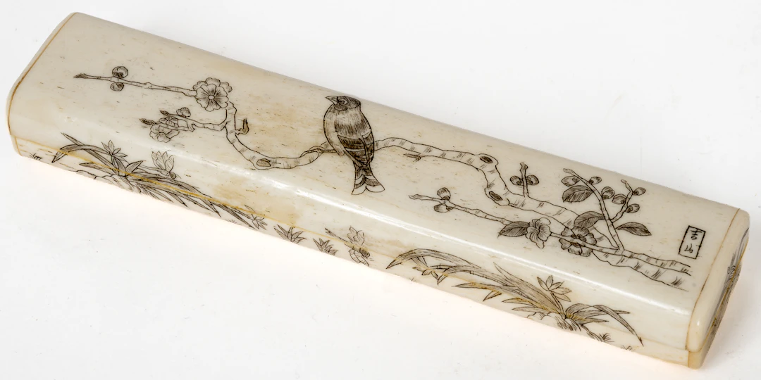 Lot 63: ELONGATED JAPANESE CASE WITH PLANT AND BIRD DECOR
