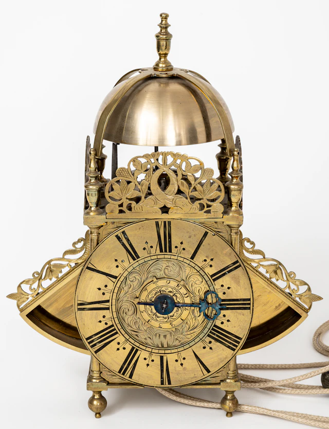 Lot 315: (215) ENGLISH WINGED LATERN CLOCK