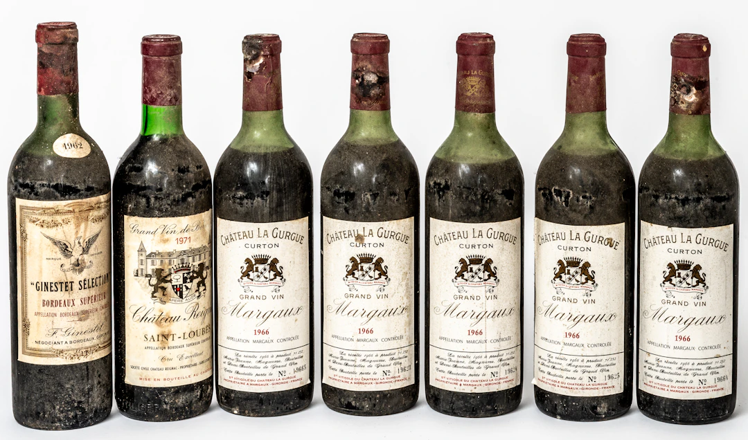 Lot 396: 7 WINE BOTTLES